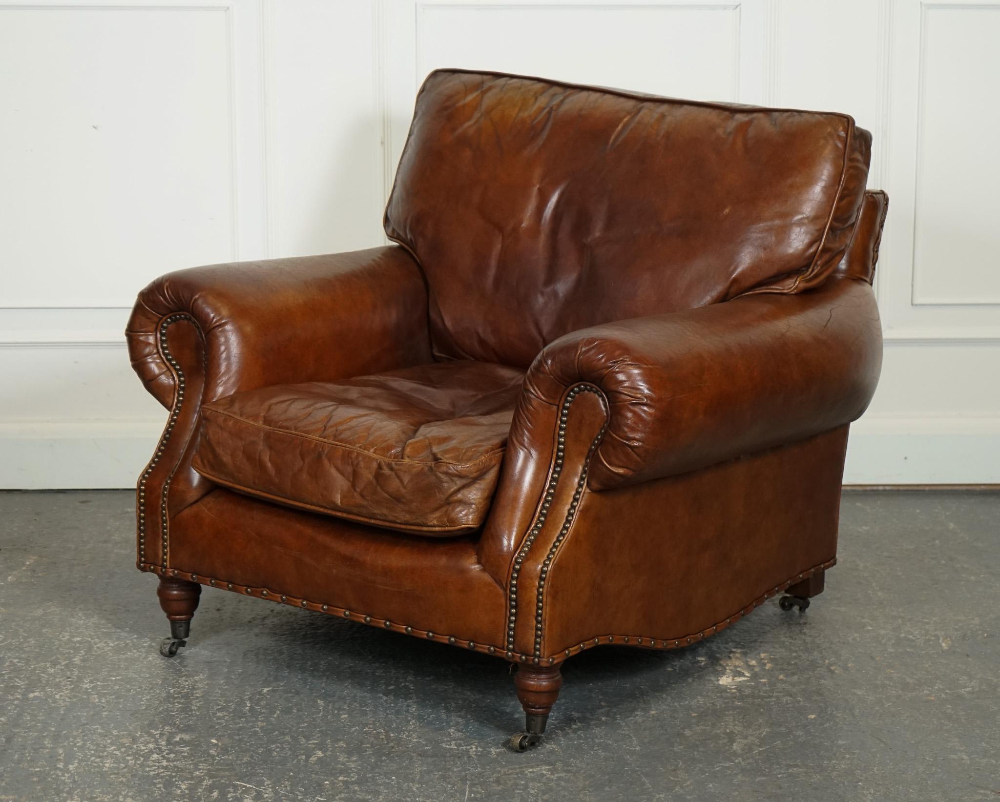
We are delighted to offer for sale this Stunning Vintage Timothy Oulton Halo Balmoral Brown Leather Armchair.

 A true masterpiece of design and craftsmanship. This armchair exudes luxury and timeless elegance with its unique combination of