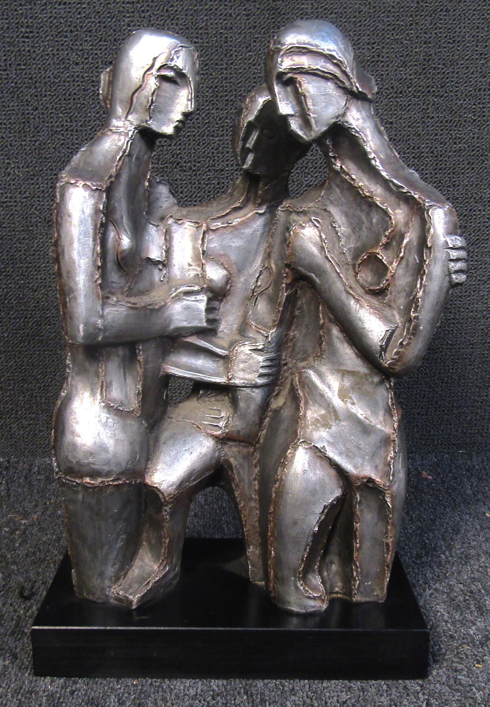 Beautiful one of a kind Picasso inspired ceramic sculpture of the Three Graces by Austin Productions. Stamped and dated 1968. This stunning and emotional sculpture features three nude women huddled together, the welded look, created in ceramic, is