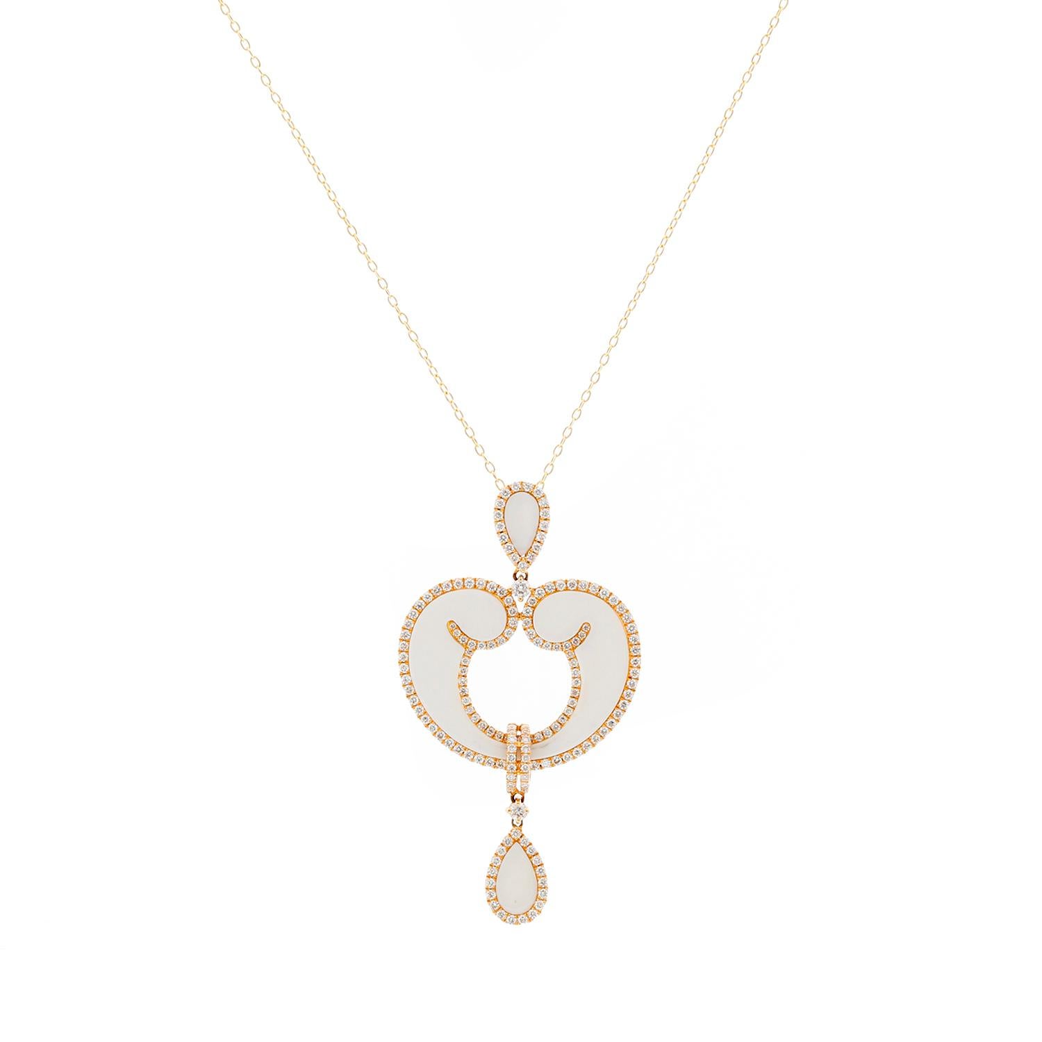 This necklace features 8.74ct white onyx and 1.05ct diamond set in 18k yellow gold.  Pendant measures apx. 2-inches in length on an 18-inch 14k yellow gold chain. Total weight is 8.2 grams. This necklace features a beautiful design and is perfect