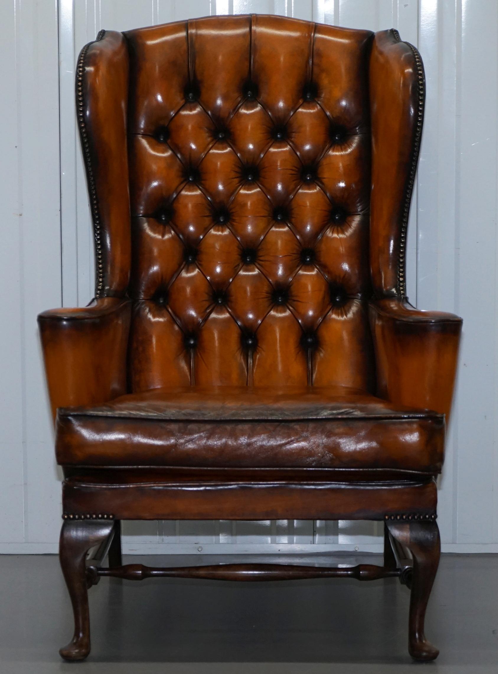 We are delighted to offer for sale this stunning fully restored Chesterfield whisky brown leather wingback armchair 

This is one of the nicer wingback chairs we have in stock, the color is rich and work and has a wonderful honest aged look and