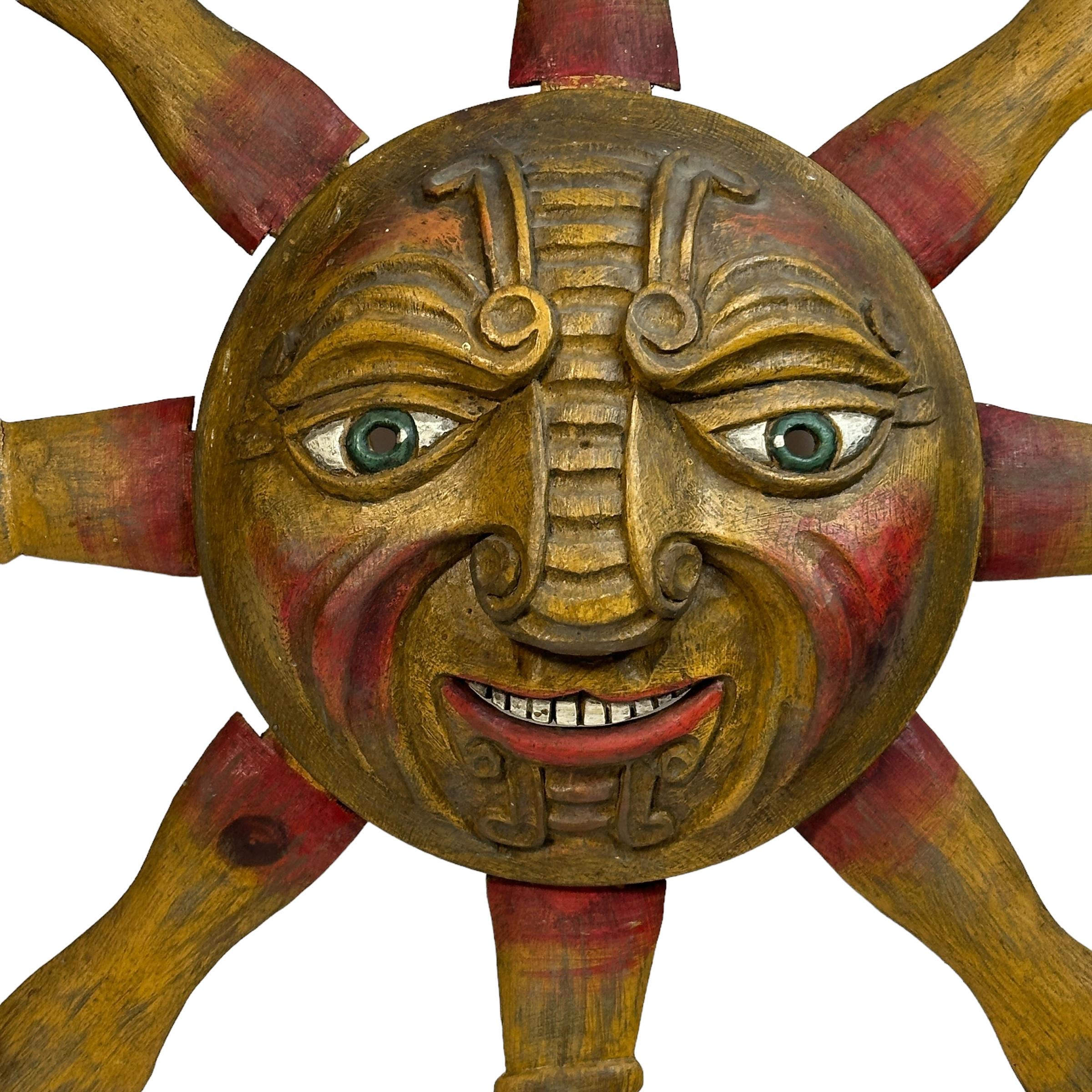 Beautiful wooden handcrafted Sun Face Wall Decoration Sculpture. Made in Germany by a wood worker in the 1930's or older. For safe and better shipping options the Sunbeams can be removed like seen in the picture. This is original made by the artist,