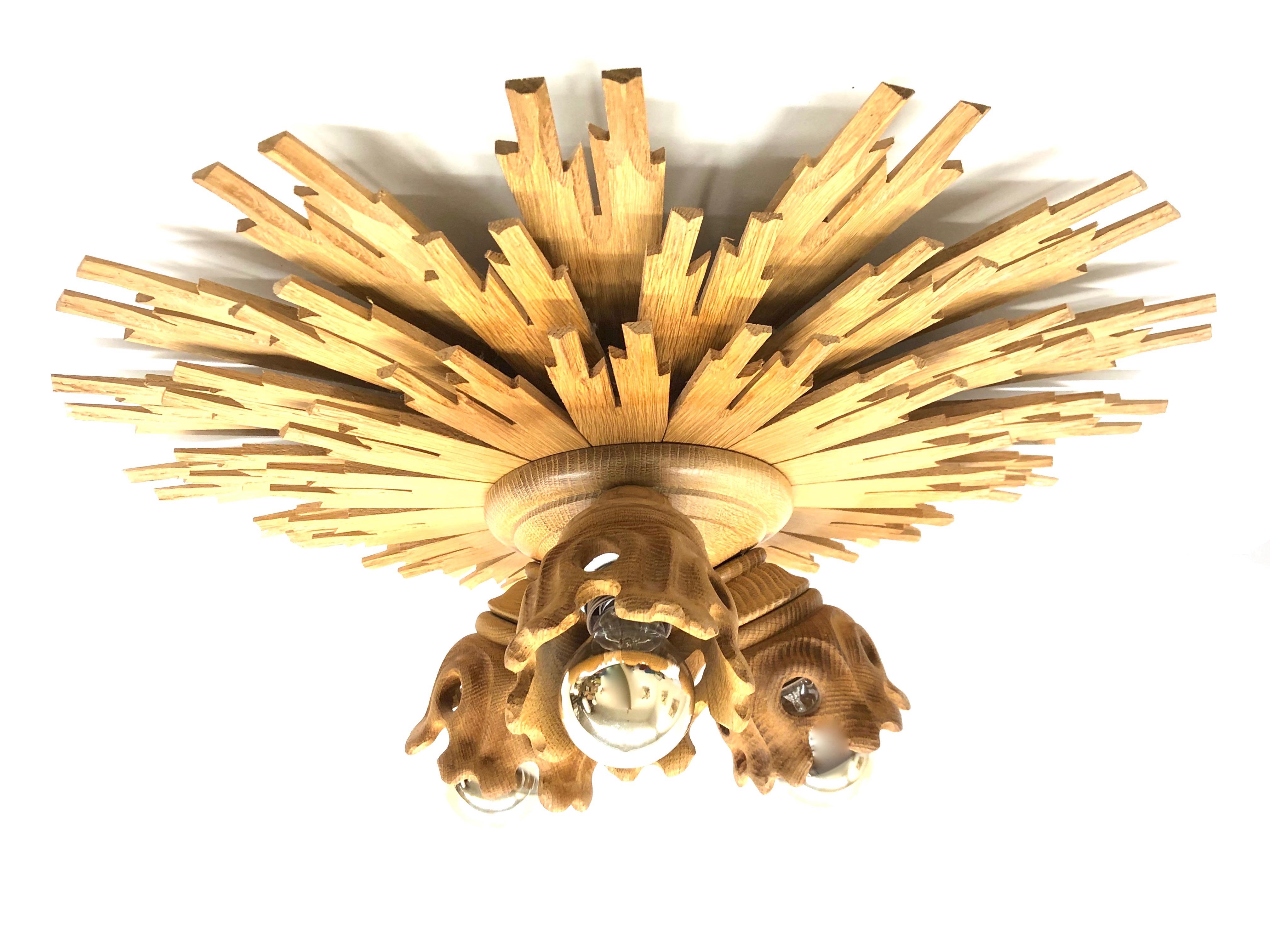 Beautiful large wooden handcrafted flush mount. Made in Germany by a wood worker. Gorgeous sunburst starburst flush mount with 3 lights. The fixture requires three European E27 / 110 Volt Edison bulbs, each bulb up to 60 watts.