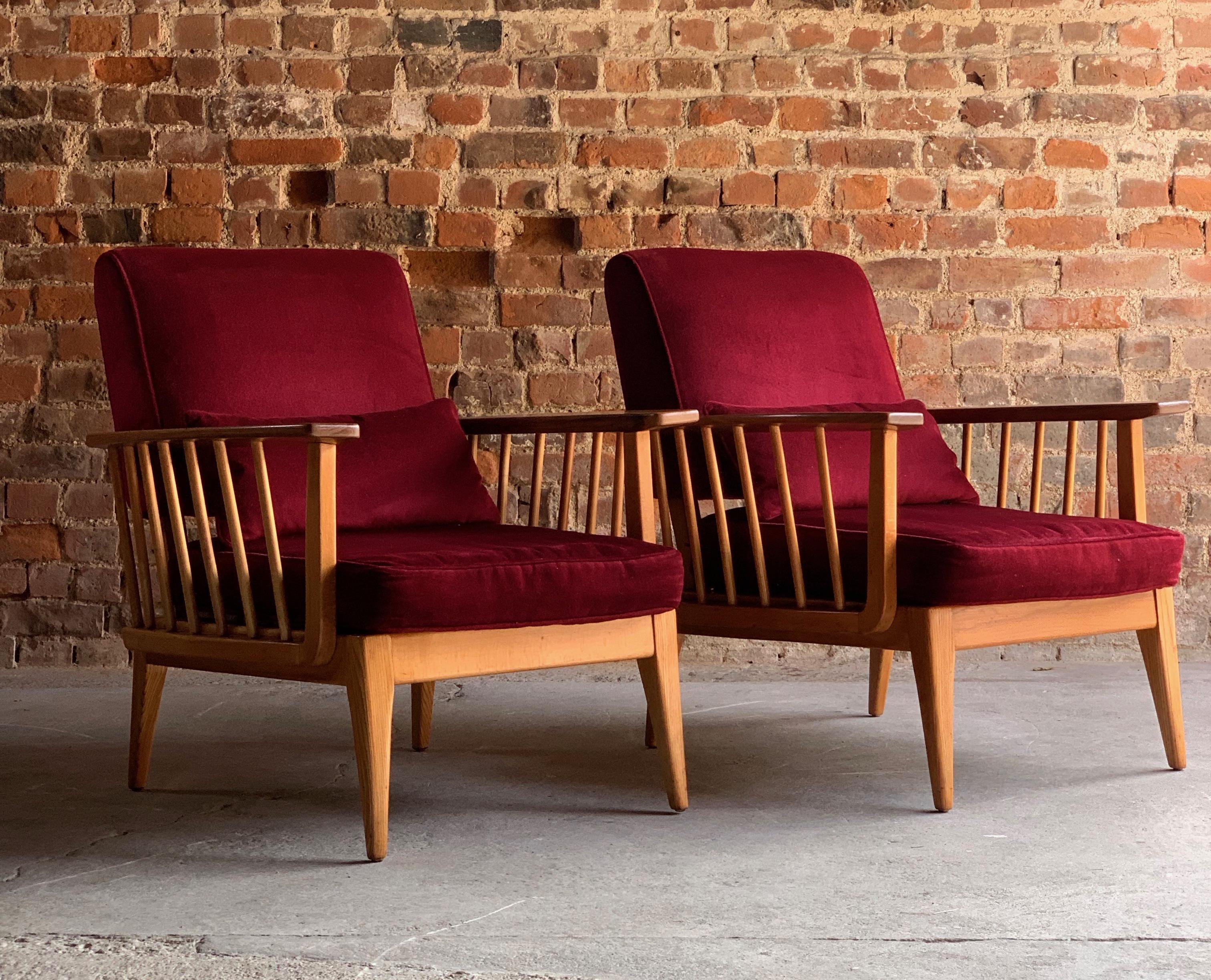 Mid-Century Modern elm sofa & two armchair suite three-piece, circa 1960s

Magnificent midcentury Blonde Elm three-piece Lounge Suite circa 1960, comprising of three-seat sofa and two matching armchairs dressed in cranberry red velvet upholstery