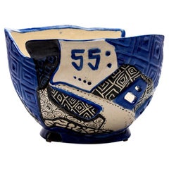 Stunting: Dikembe Mutombo Vessel in Porcelain and Luster by Roberto Lugo