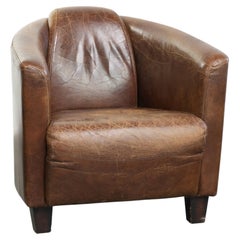 Poltrona dal design "Aviator" in robusta pelle di vacchetta color cognac