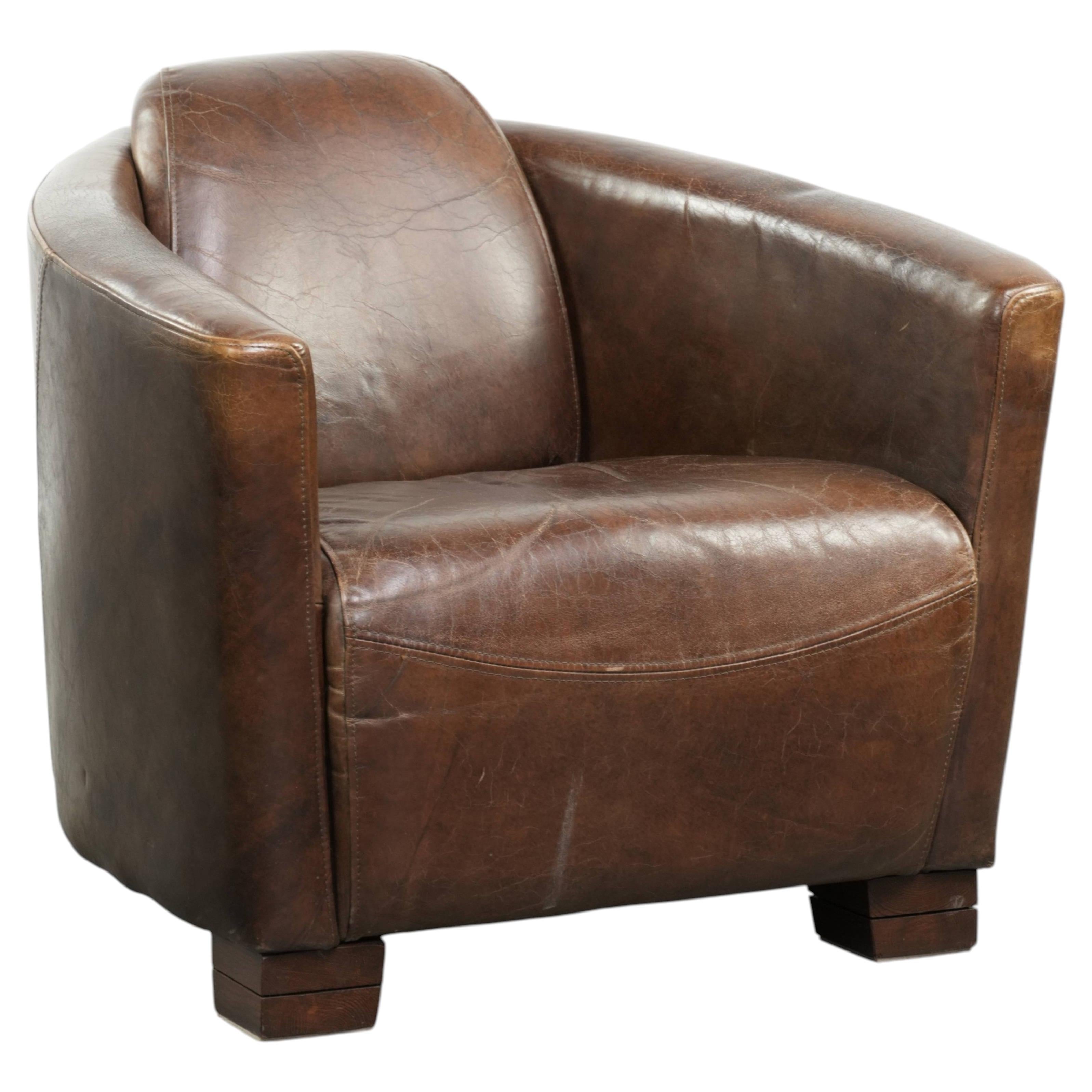 Sturdy dark cognac brown cow leather Aviator design armchair