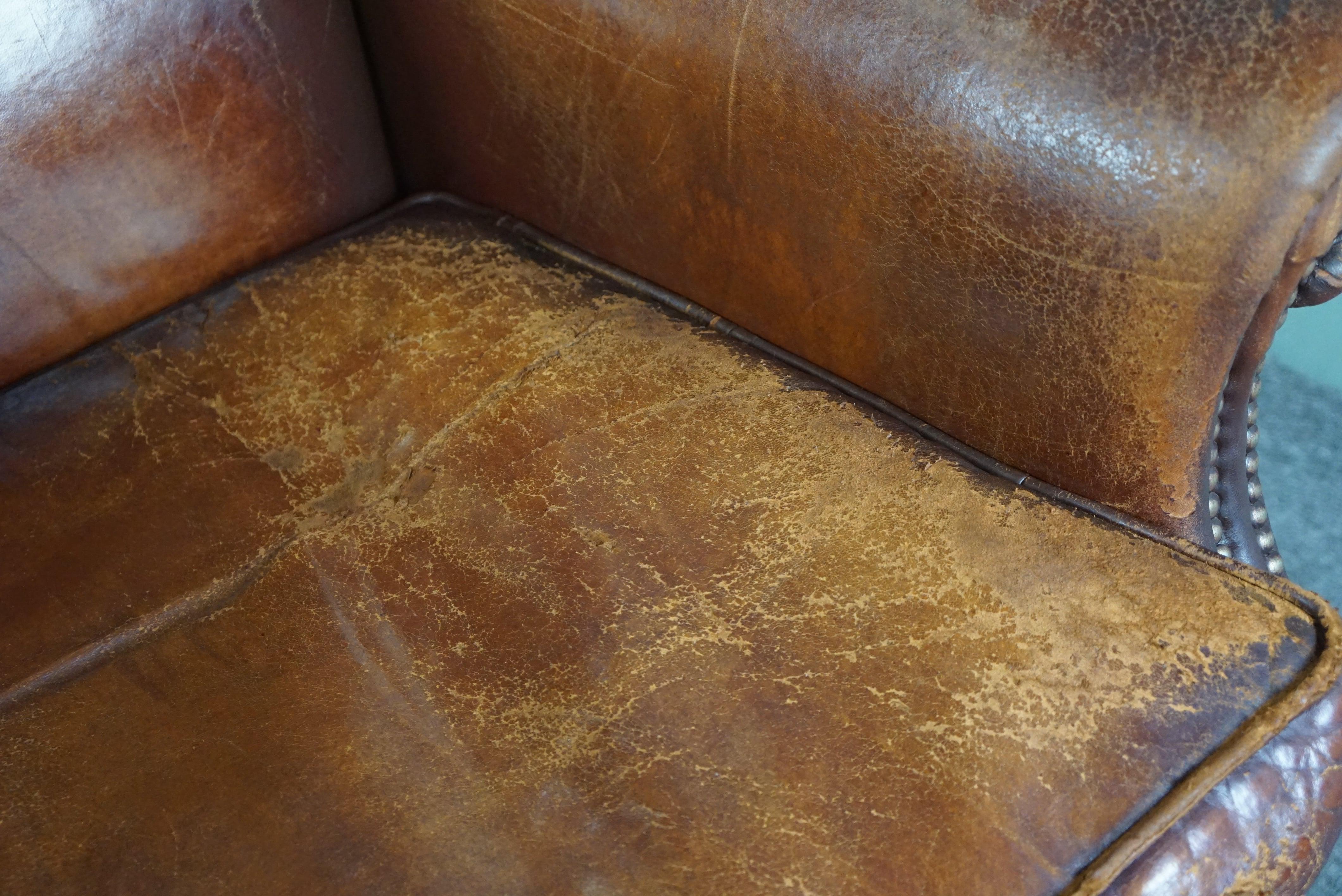 Sturdy sheep leather armchair with a distressed look For Sale 6