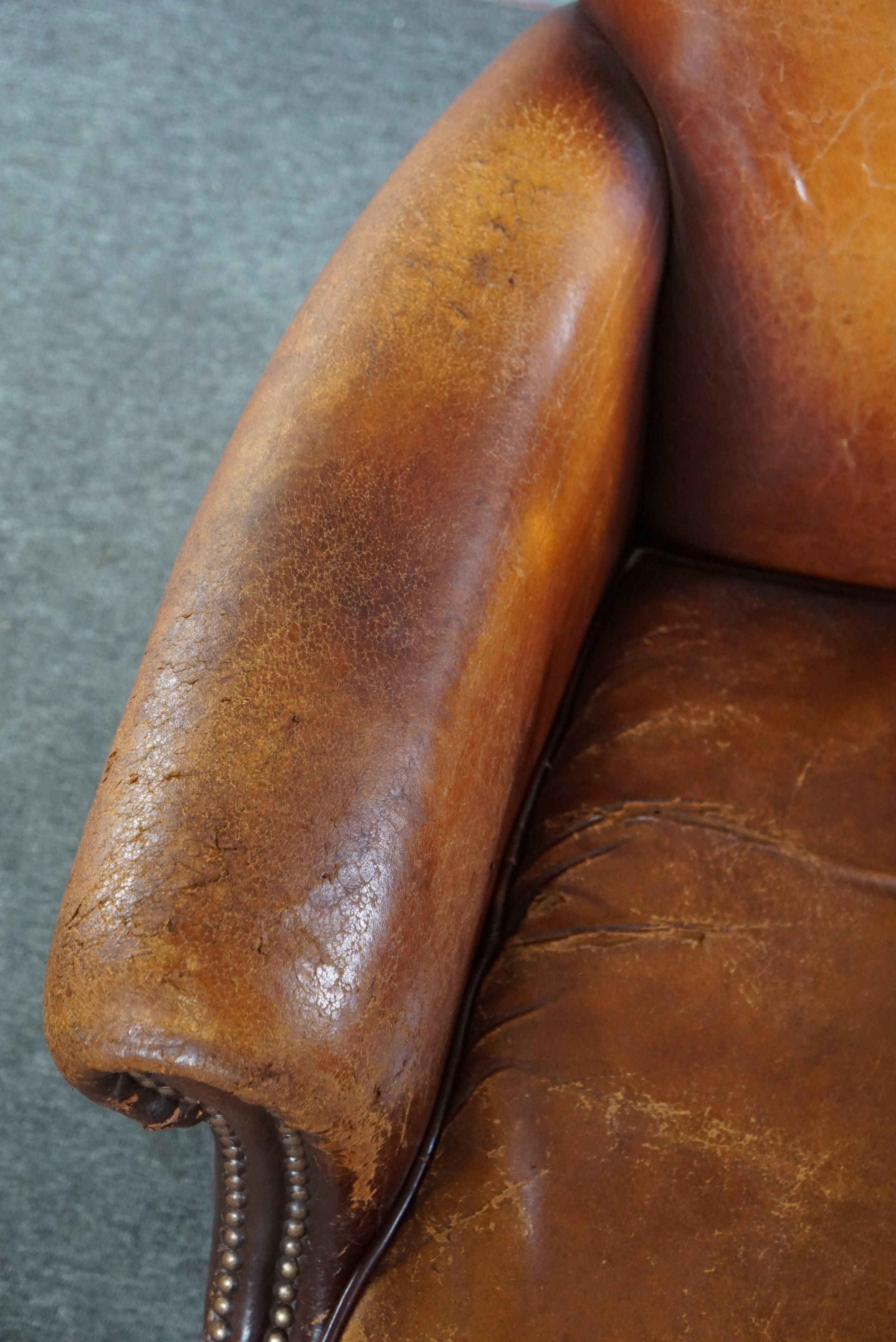 Sturdy sheep leather armchair with a distressed look For Sale 2