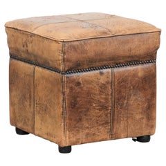 Sturdy square vintage sheepskin pouf/ottoman with beautiful colours