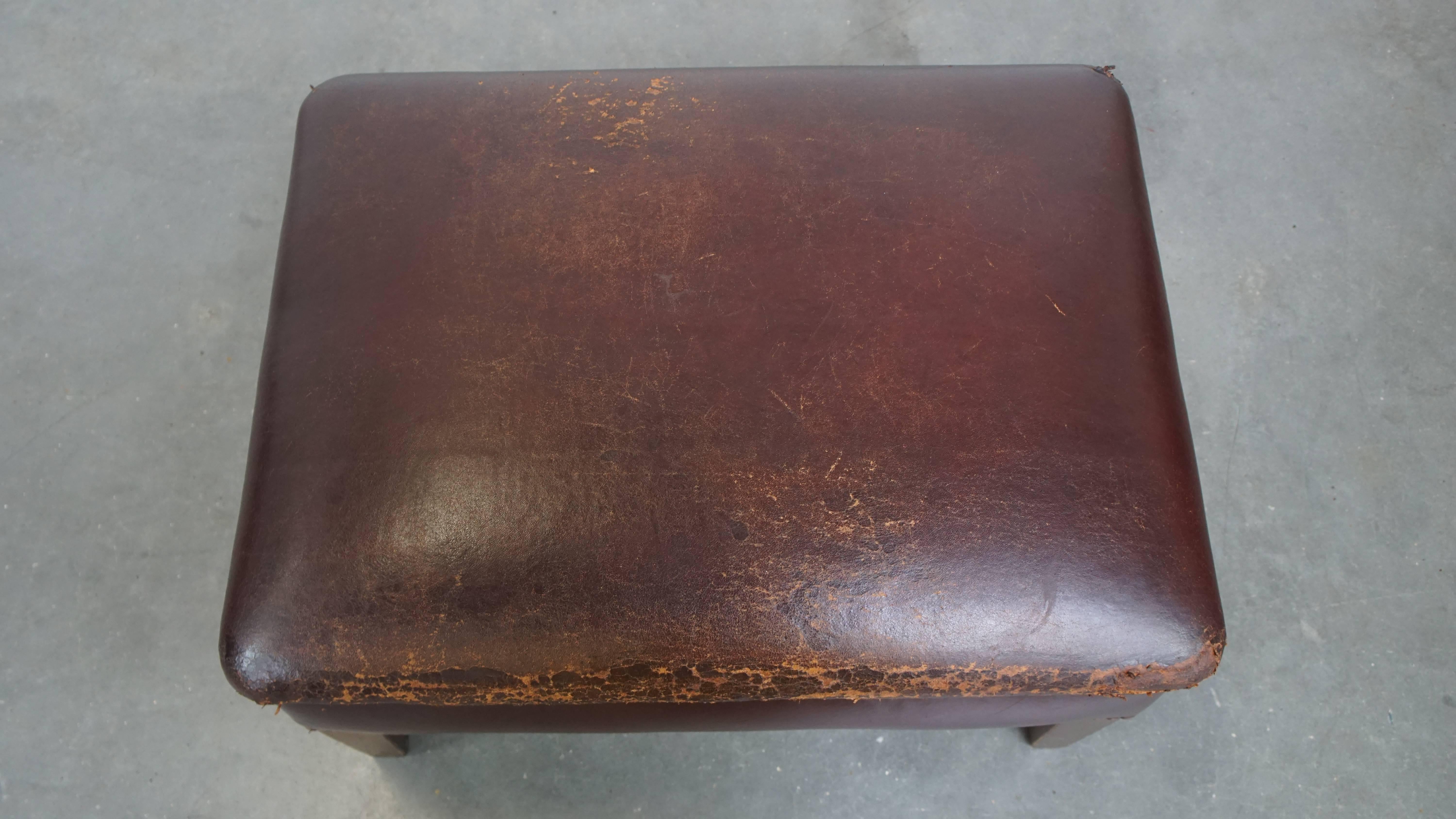 Sturdy Vintage Ottoman Made of Sheepskin Leather In Fair Condition For Sale In Harderwijk, NL