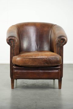 Sturdy vintage sheepskin club armchair