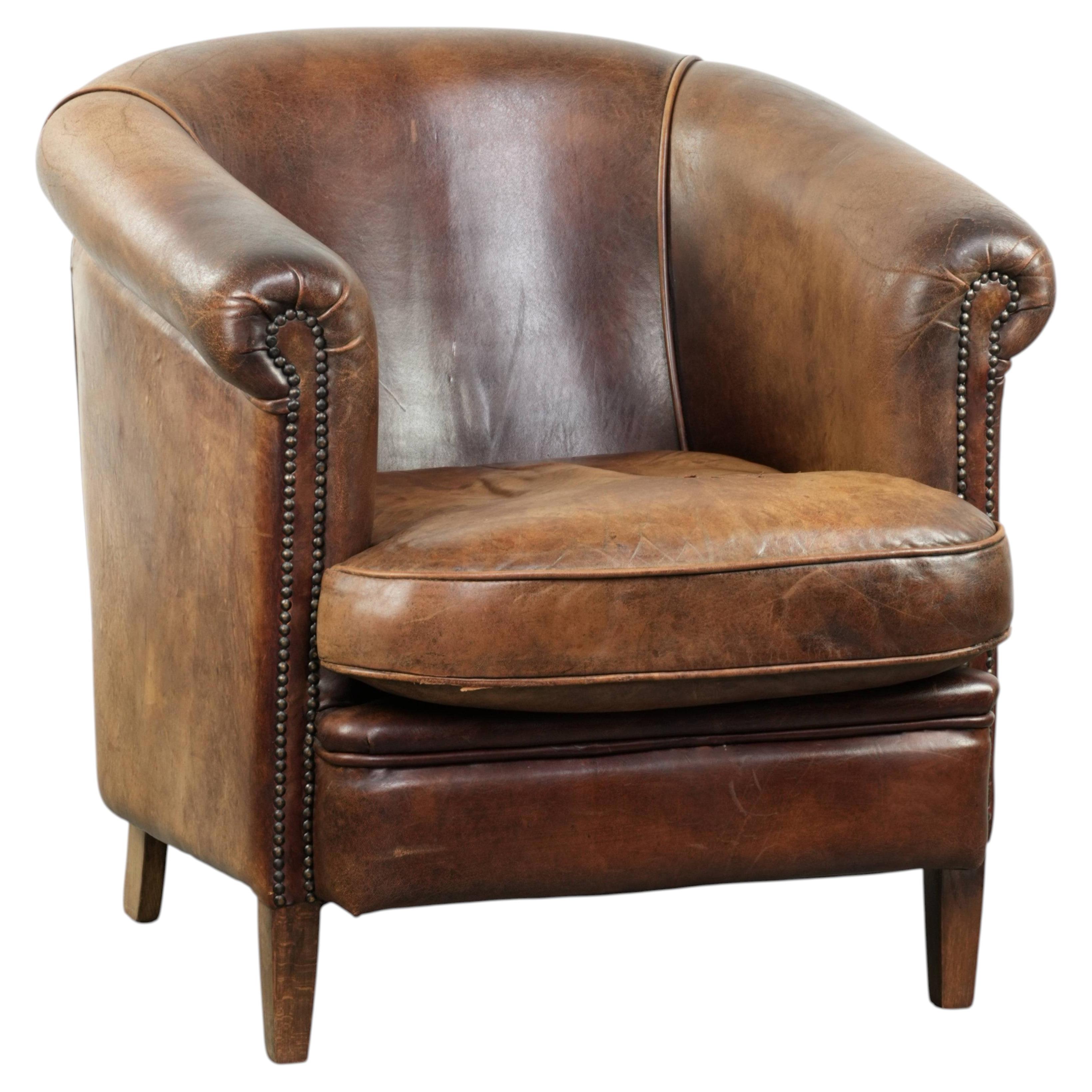 Sturdy vintage sheepskin club armchair