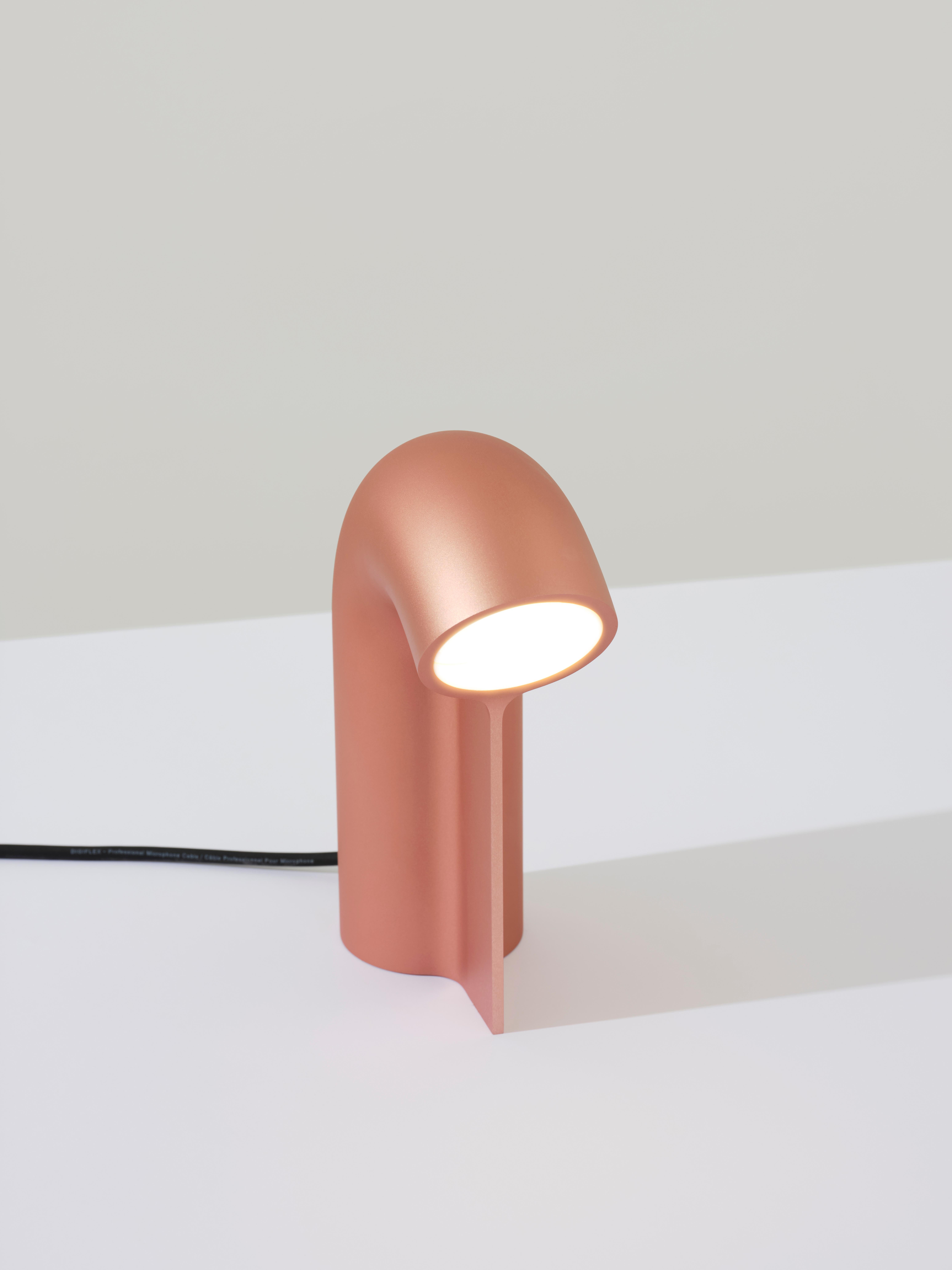 The Stutter Lamp is milled from a solid block of aluminum using a 5-axis milling machine. Its shape mimics having been cut from a larger object with tactility premier in its creation. 

Emitting a downward warm glow, the Stutter Lamp is a perfect