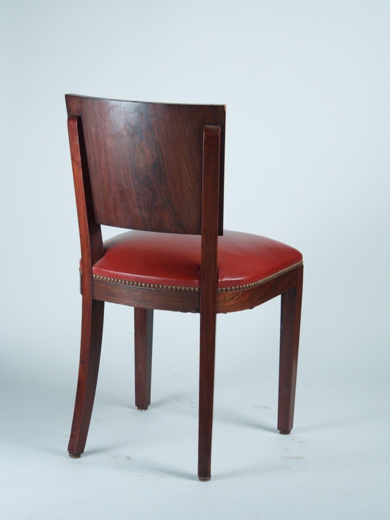 French Modernist Art Deco dining chairs in the style of DIM. Set of 6 in rosewood and mahogany. Measures: 18