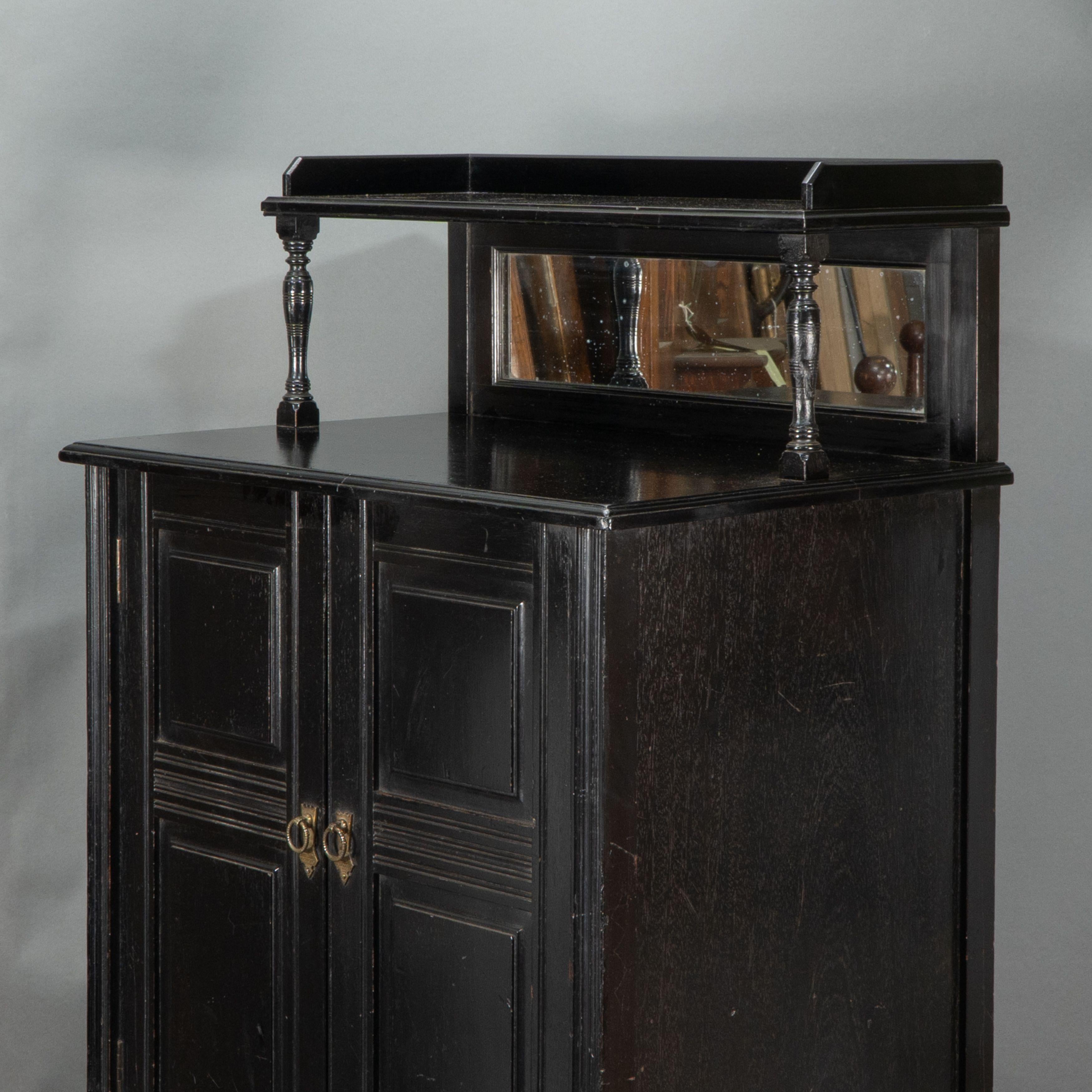 Style of E W Godwin. An Aesthetic Movement ebonized cabinet For Sale 3