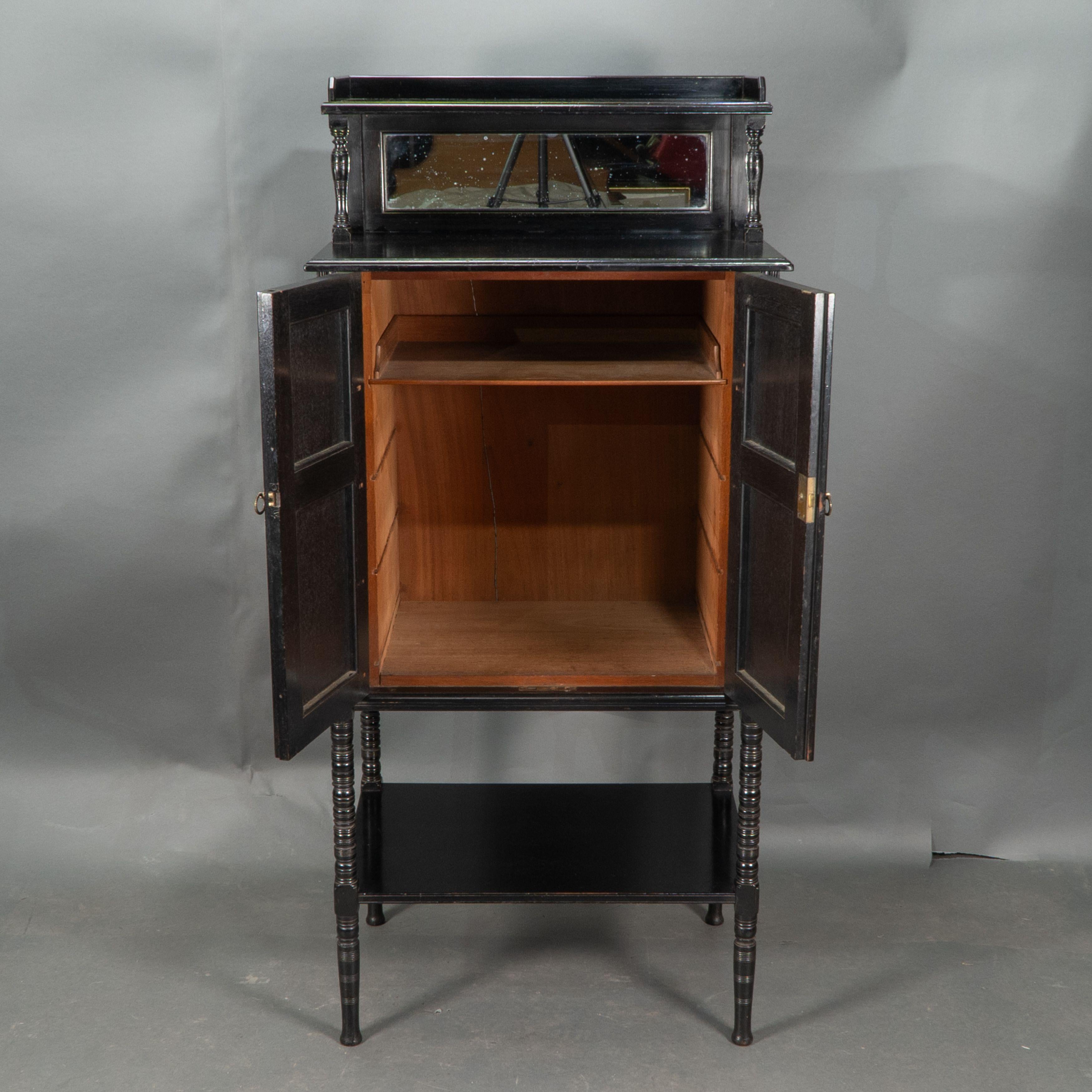 Style of E W Godwin. An Aesthetic Movement ebonized cabinet For Sale 5