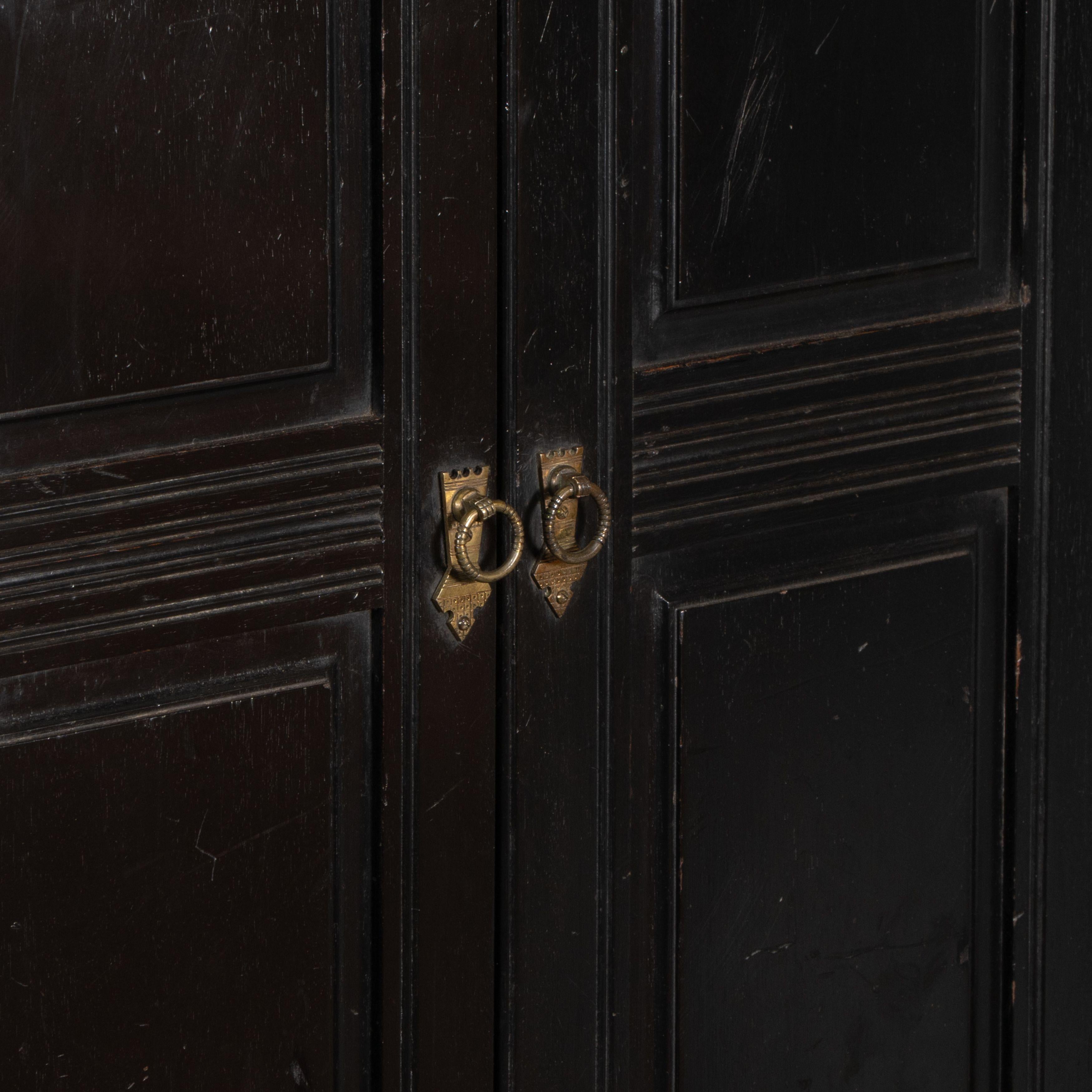 Style of E W Godwin. An Aesthetic Movement ebonized cabinet For Sale 6