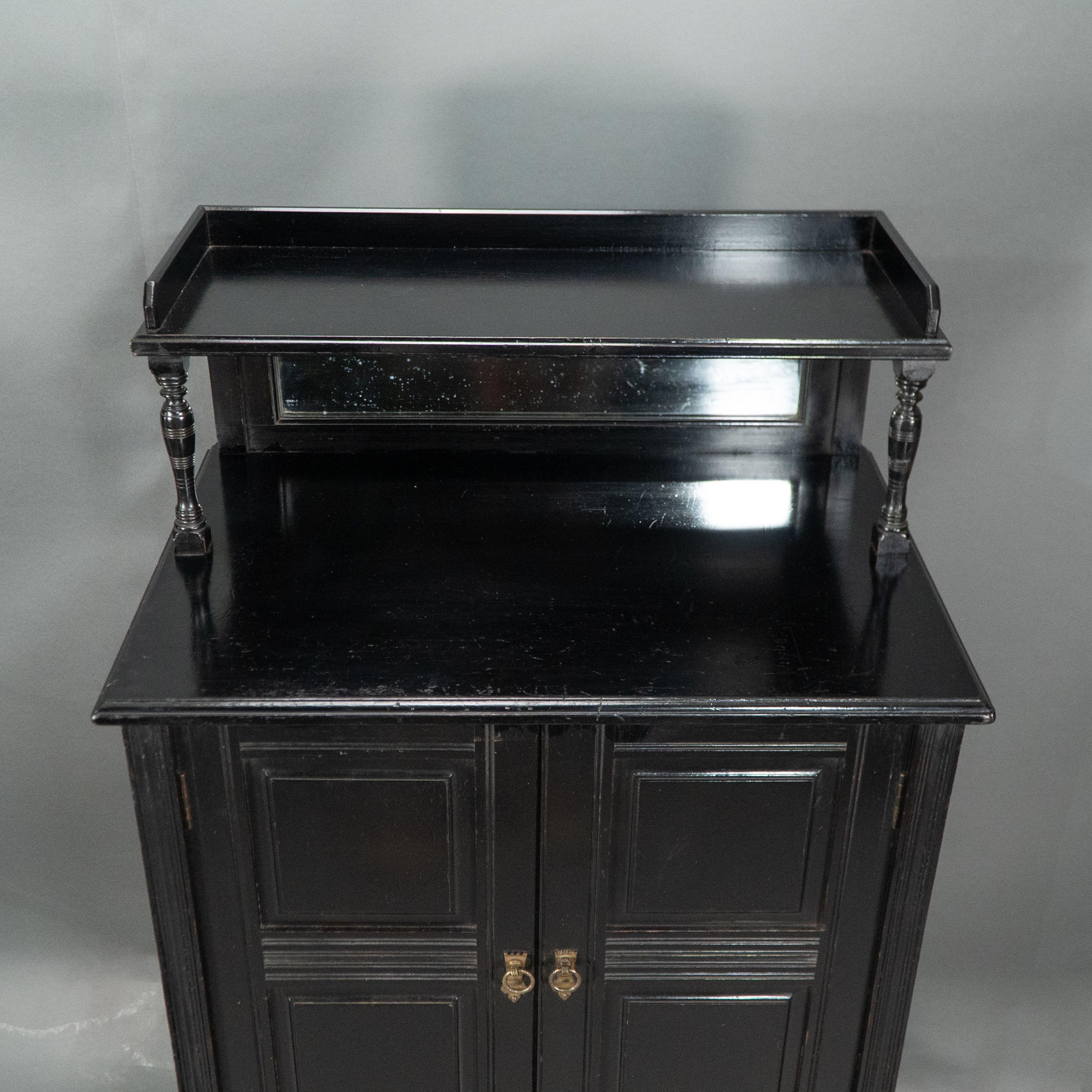 Style of E W Godwin. An Aesthetic Movement ebonized cabinet For Sale 9