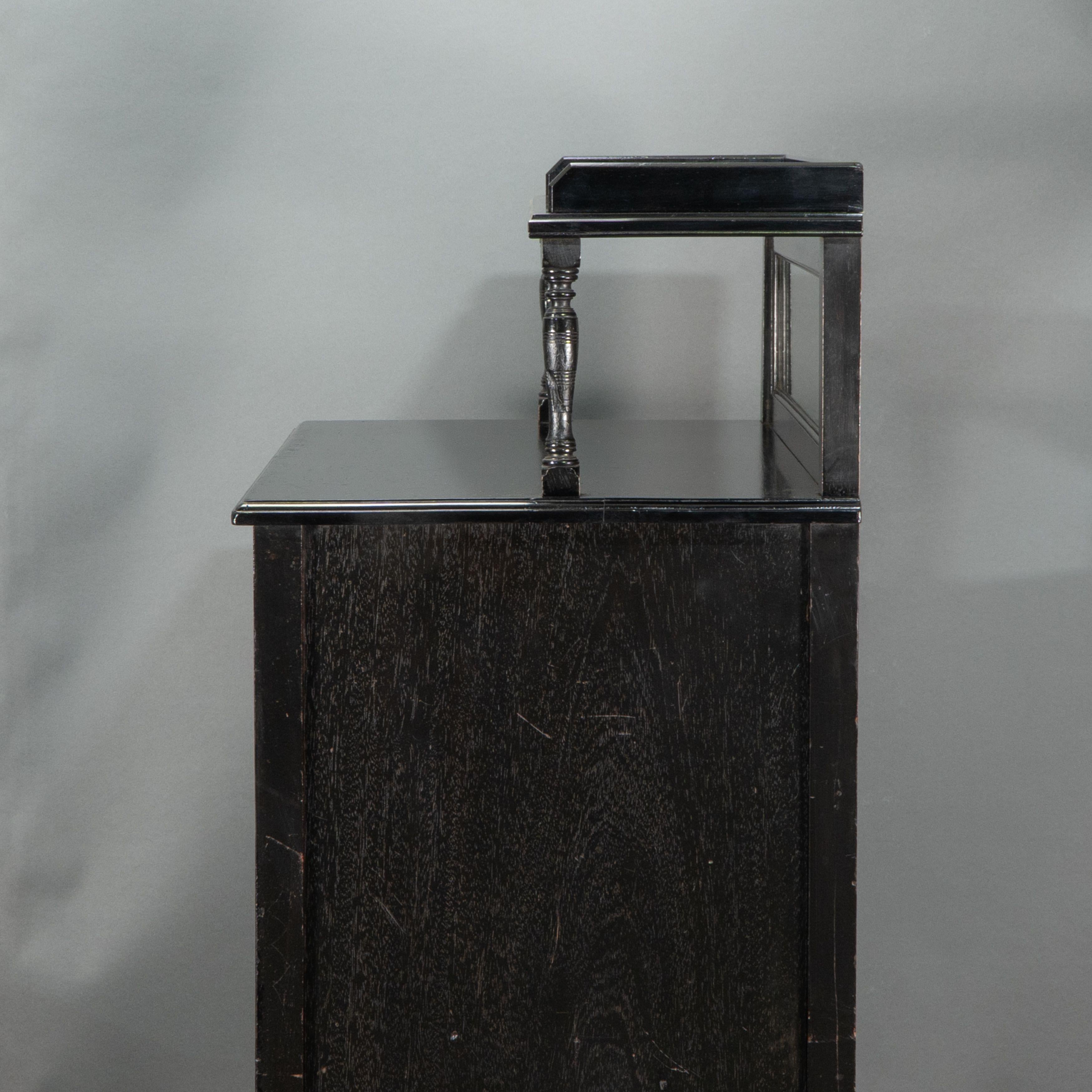 Style of E W Godwin. An Aesthetic Movement ebonized cabinet For Sale 2