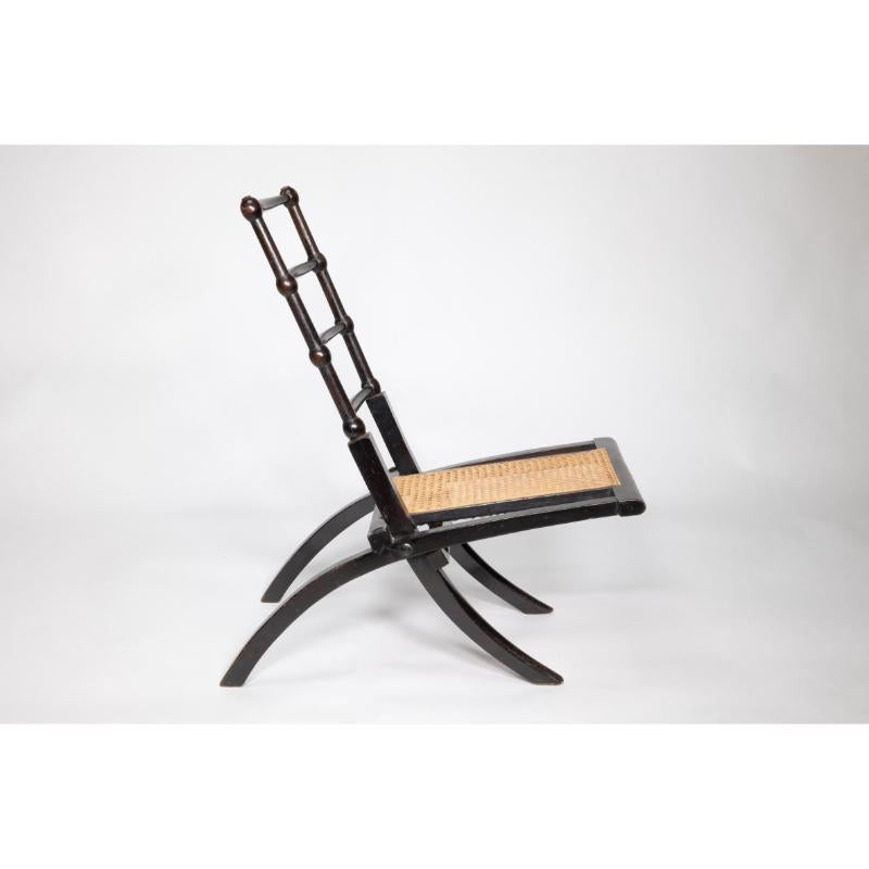 Late 19th Century EW Godwin Style of. Aesthetic Movement ebonized folding chair with new cane seat For Sale