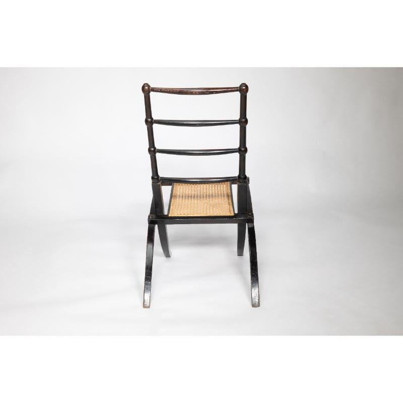 Ebonized EW Godwin Style of. Aesthetic Movement ebonized folding chair with new cane seat For Sale