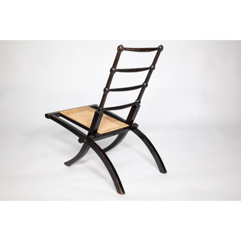 English EW Godwin Style of. Aesthetic Movement ebonized folding chair with new cane seat For Sale