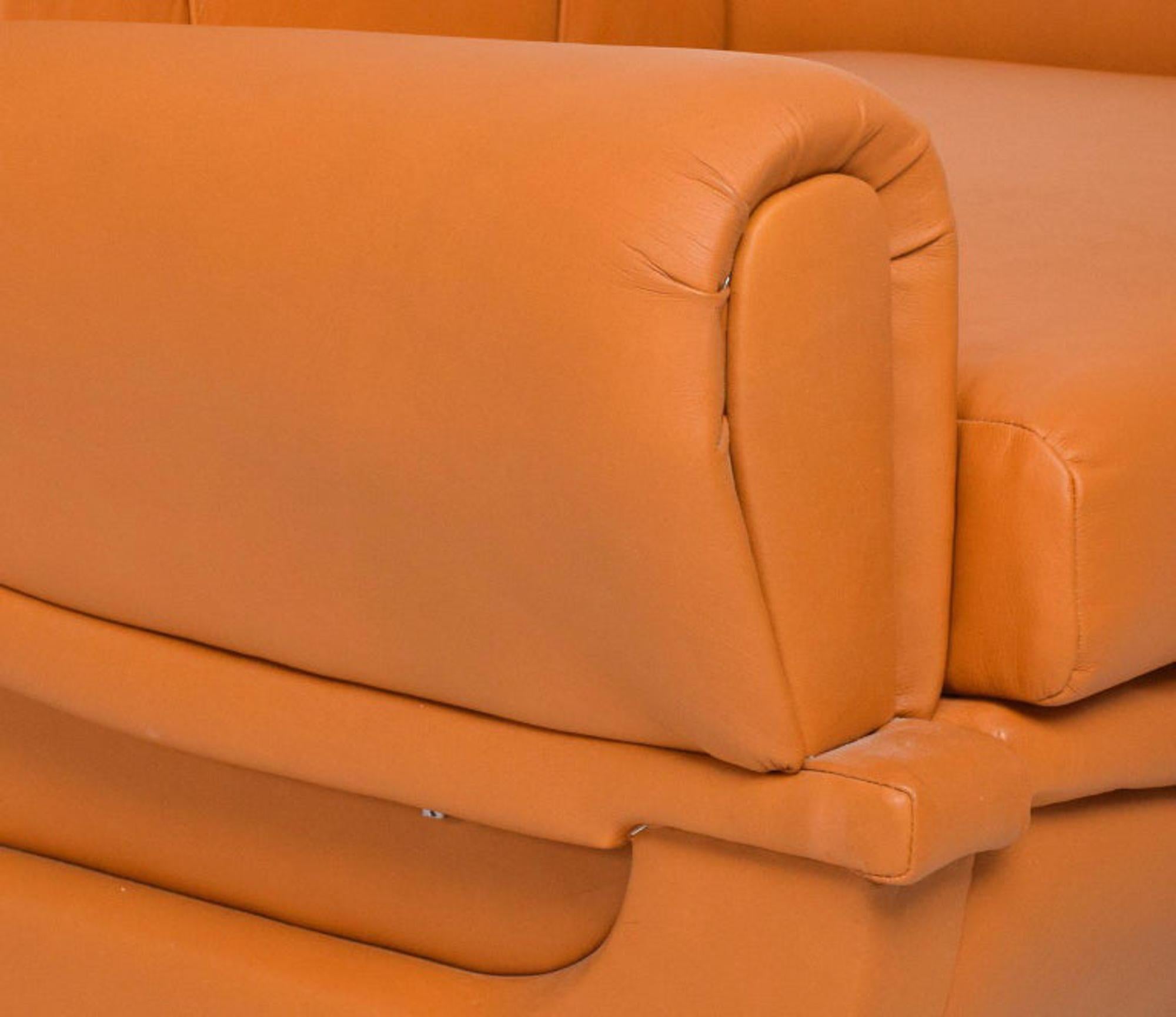 Butterscotch Leather Art Deco Lounge Armchairs set of 2. 
Designed by Giuseppe Munari of Italy
Chairs are unmarked.
Inspiration Jean Michel Frank of France.
33 H X 39 D x 34 W inches
Seat: 16.5 tall, armrest 20.5
Chairs acquired in northern Italy.