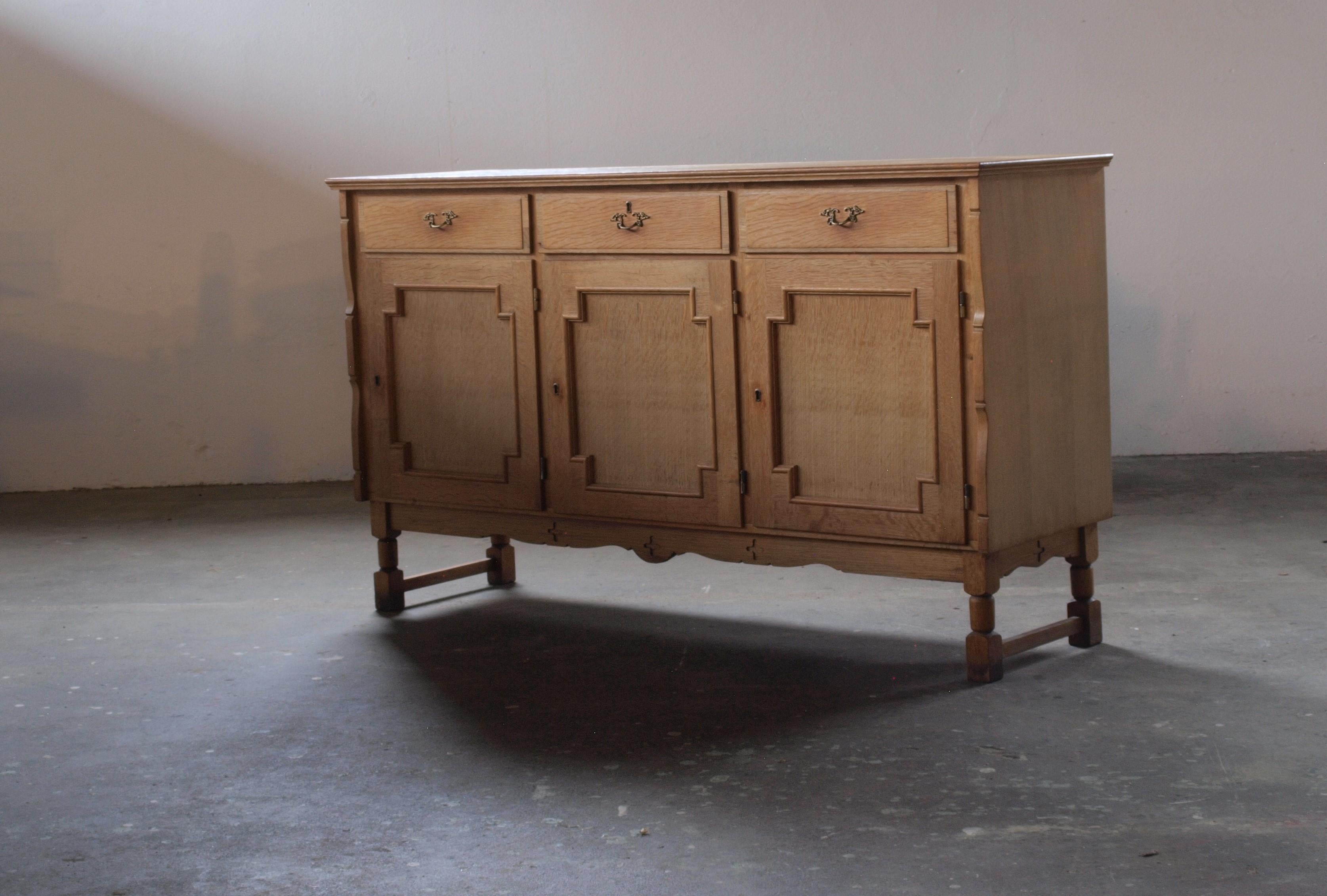 Exquisite brutalist-style sideboard by G.D. Egereoler, reminiscent of 1960s design akin to Henning Kjærnulf. The sideboard, once adorned with a top, now boasts a unique patina, with subtle wood tone variations where the sun has kissed its surface—a