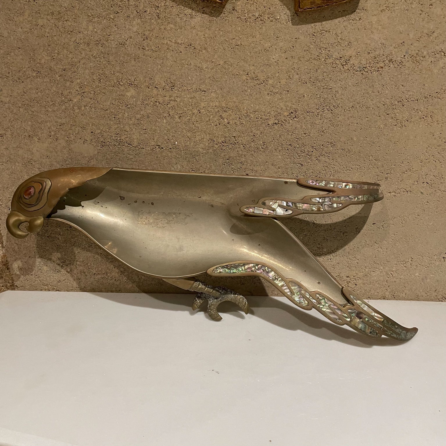 Parrot bowl handwrought metals
Exquisite Parrot in handwrought mixed metals serving dish decorative centerpiece bowl.
Married metals with agate stone and abalone inserts.
Style of Los Castillo made in Mexico modern midcentury 1970s.
Signed with