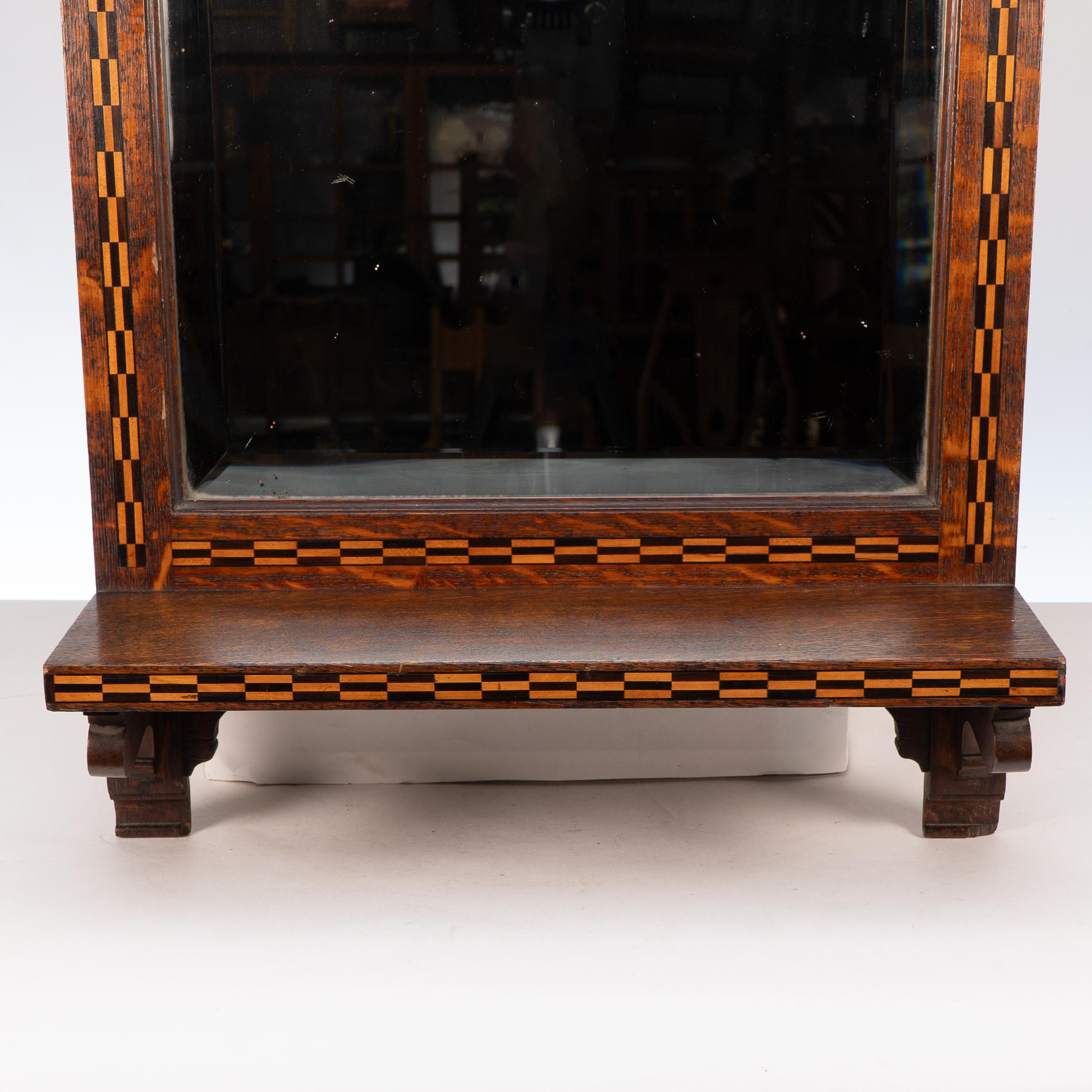 Arts and Crafts Style of M H Baillie Scott an Arts & Crafts Oak Mirror with Chequer Inlays