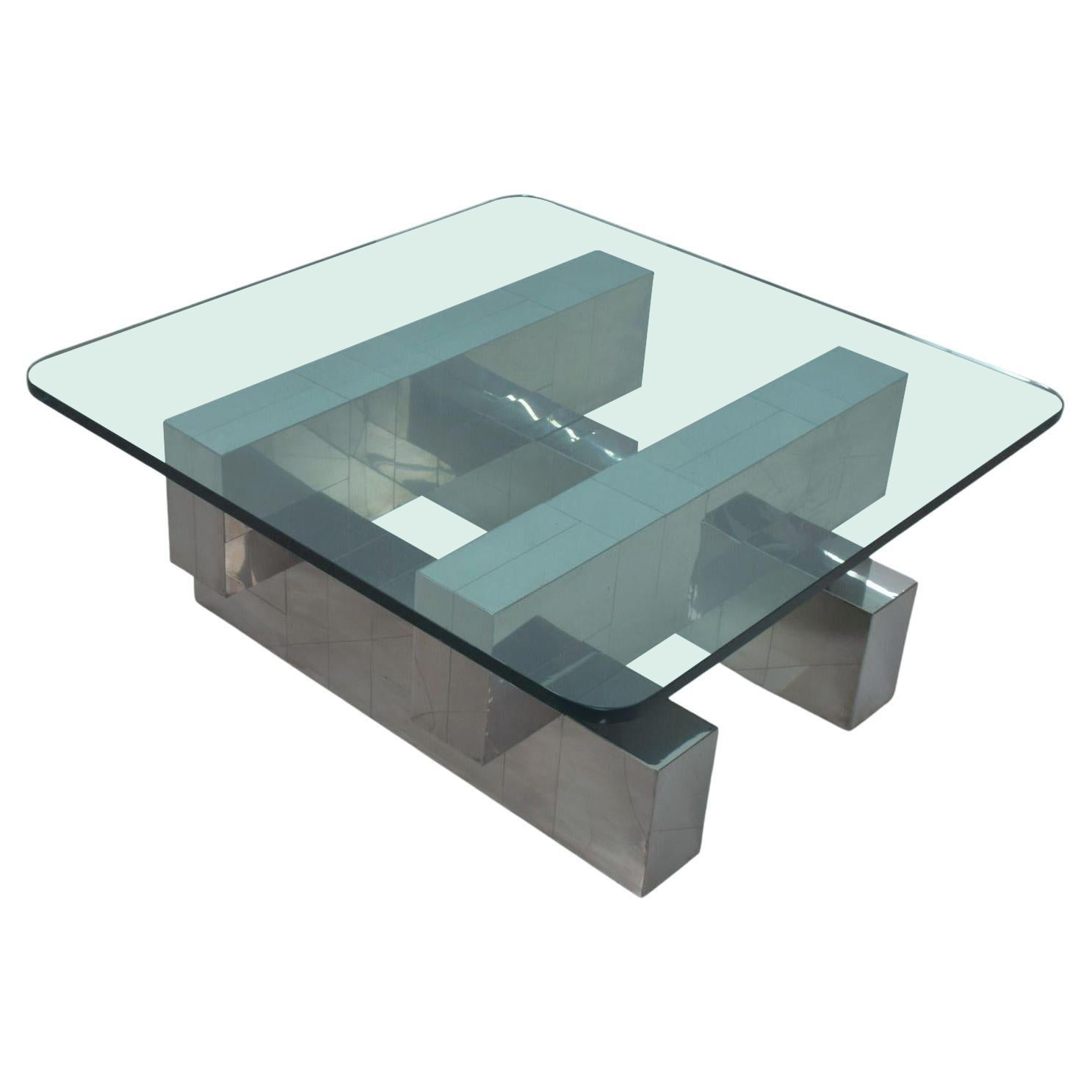 Coffee Table Base
Attribution style of Paul Evans Cityscape coffee table base in chromed stainless steel geometric crisscross design 1970s
 Unmarked.
Dimensions: 30x 30 x 14.25 inches H (base only),
(Glass is not included in sale 36 x 36)
Original