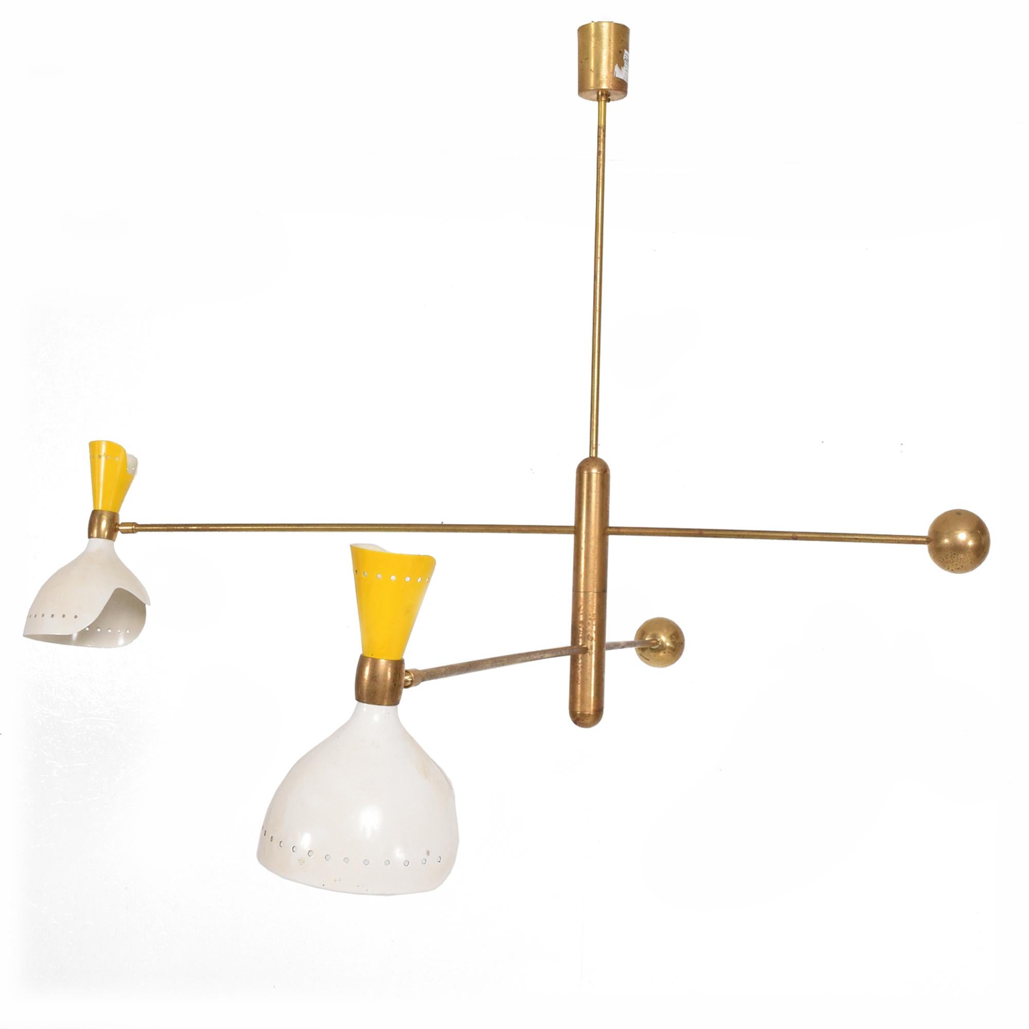 Italian Modern Magical Mobile chandelier light fixture presents in the style of Stilnovo design. 
Made in Italy. No maker label is apparent.
Brass body with double shades in Sunny yellow with Off white.
Arms are fully adjustable. 
With poetic