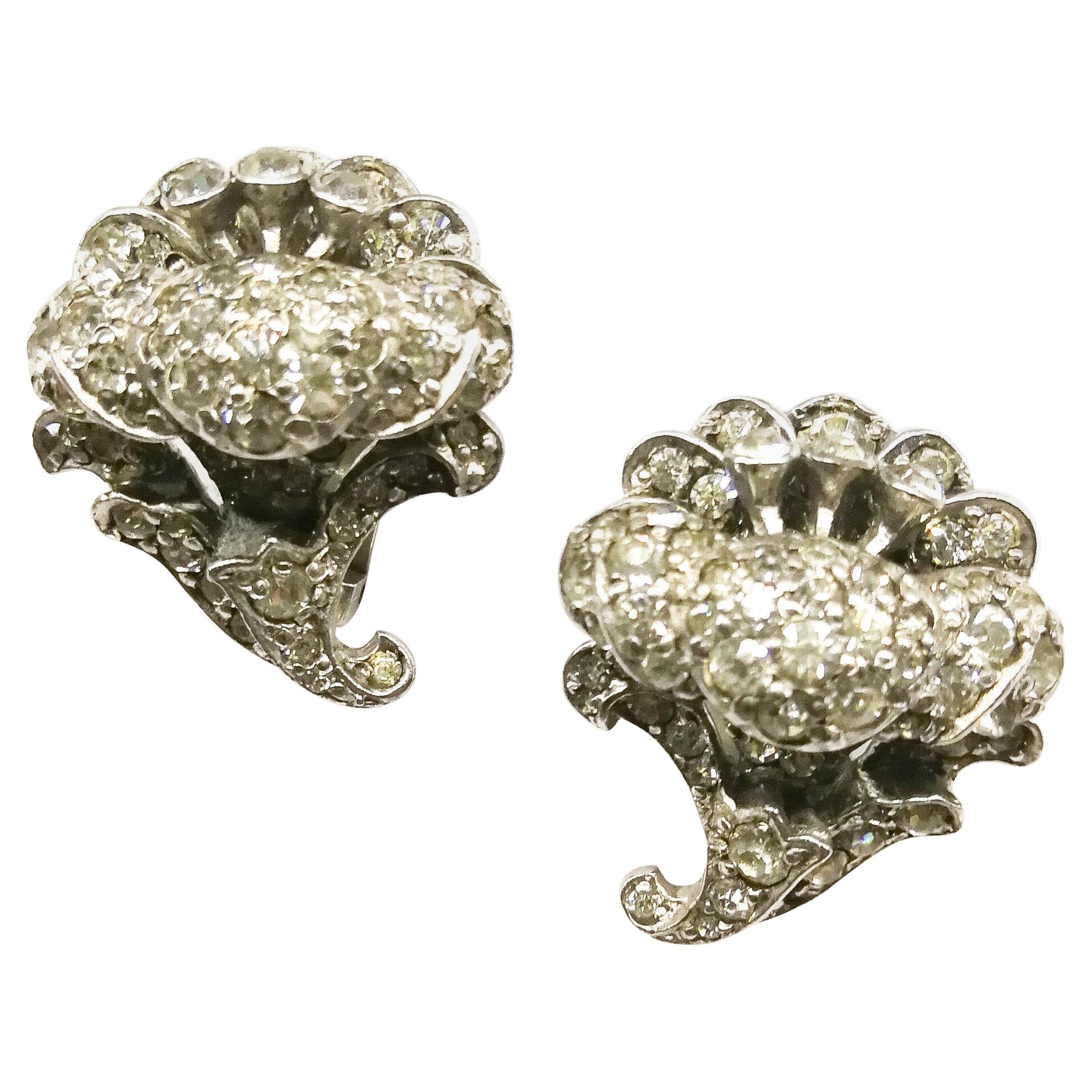 Stylised clear paste and metal 'flower' earrings, Ciro, London, c1950s For Sale