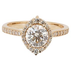 Stilvoller Halo-Ring aus 18 Karat Gelbgold mit 1,12 Karat dreifachen ausgezeichneten Diamanten im Idealschliff 