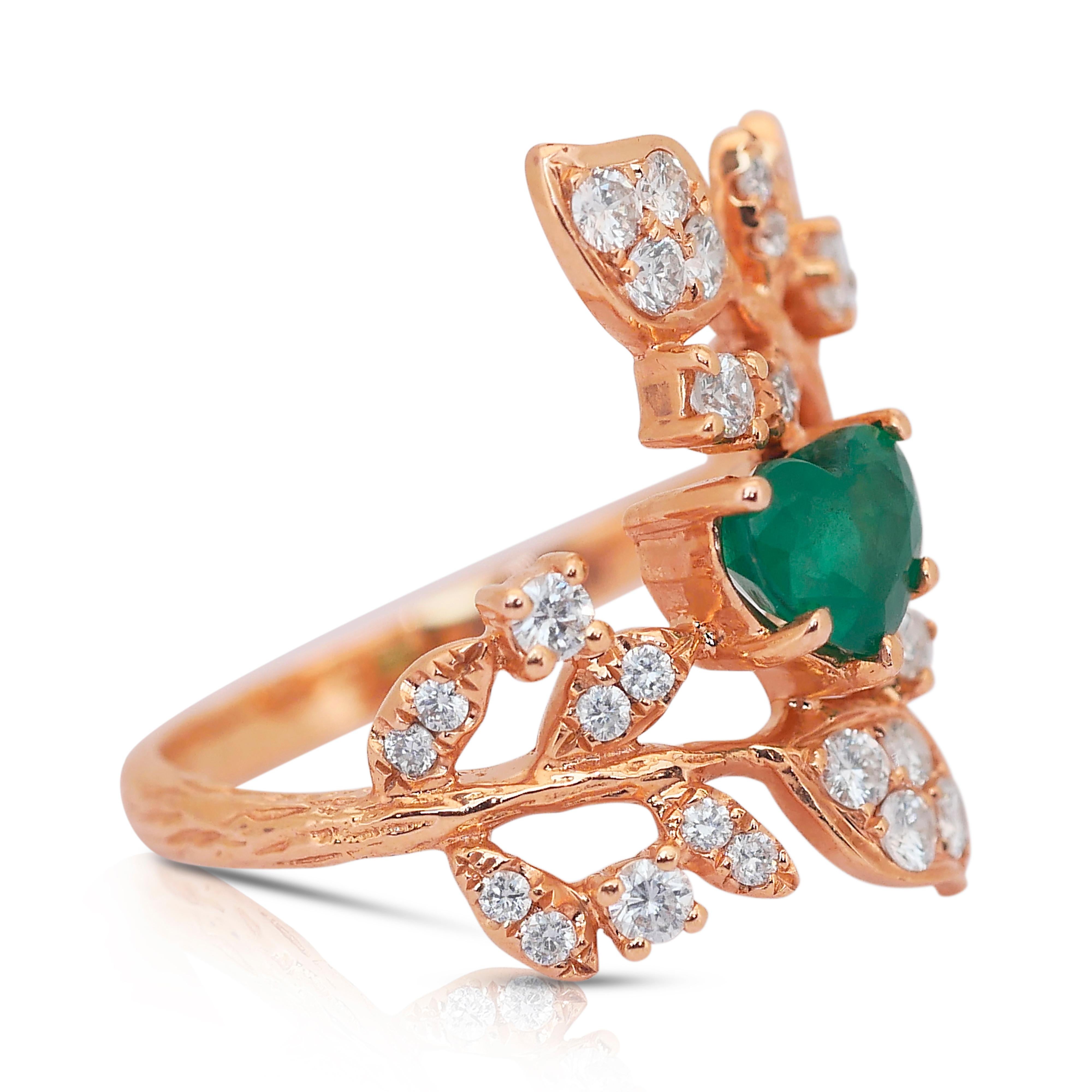 Stylish 1.50ct Emerald and Diamonds Ring in 18k Rose Gold - IGI Certified

A symbol of love and elegance, this 18k rose gold ring features a breathtaking 0.80ct heart-shaped emerald, glowing in a lush green hue. Encircling this enchanting gem are 34
