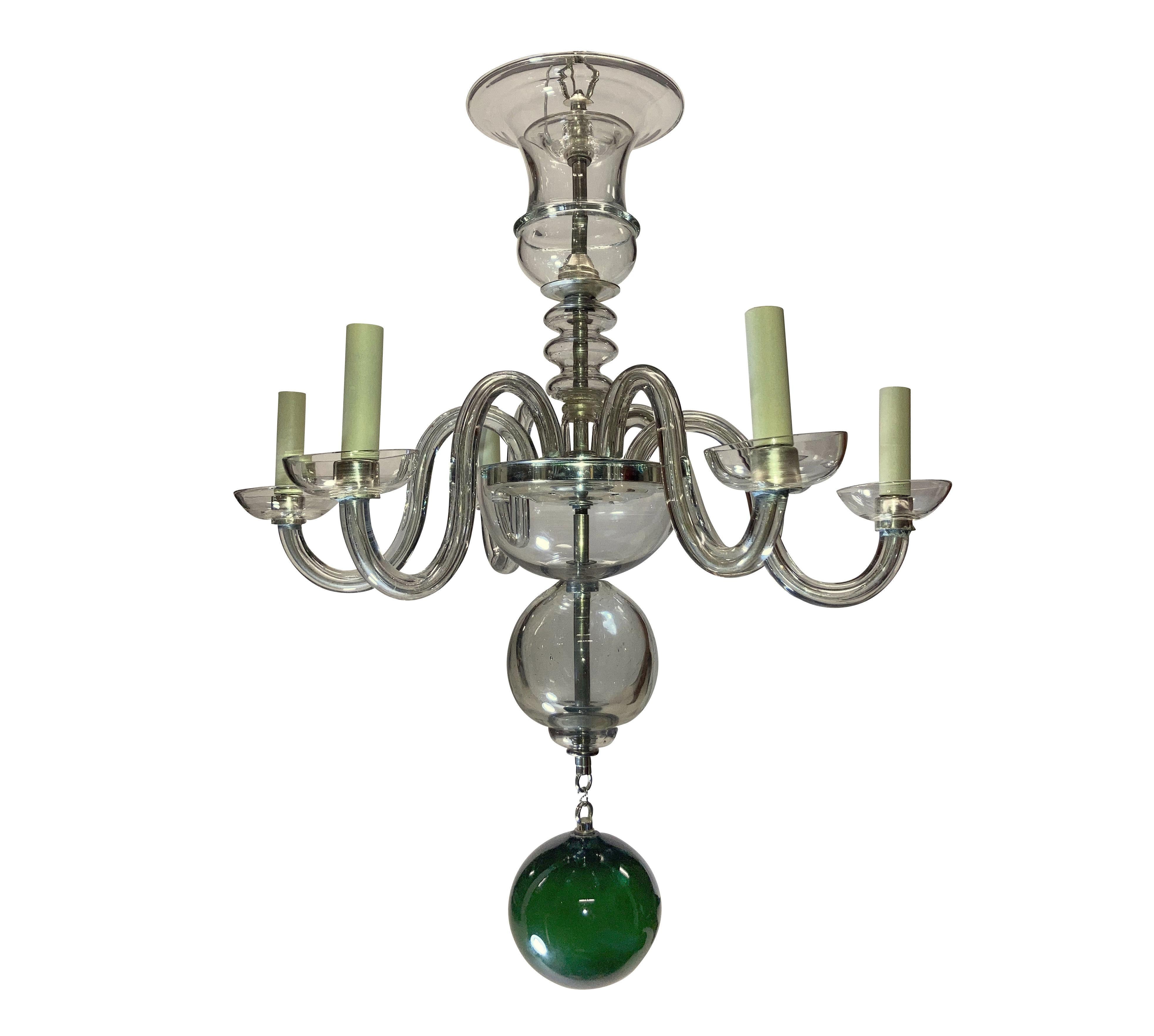 A stylish Venetian chandelier of six arms in hand blown glass, with a large emerald green pendant ball.