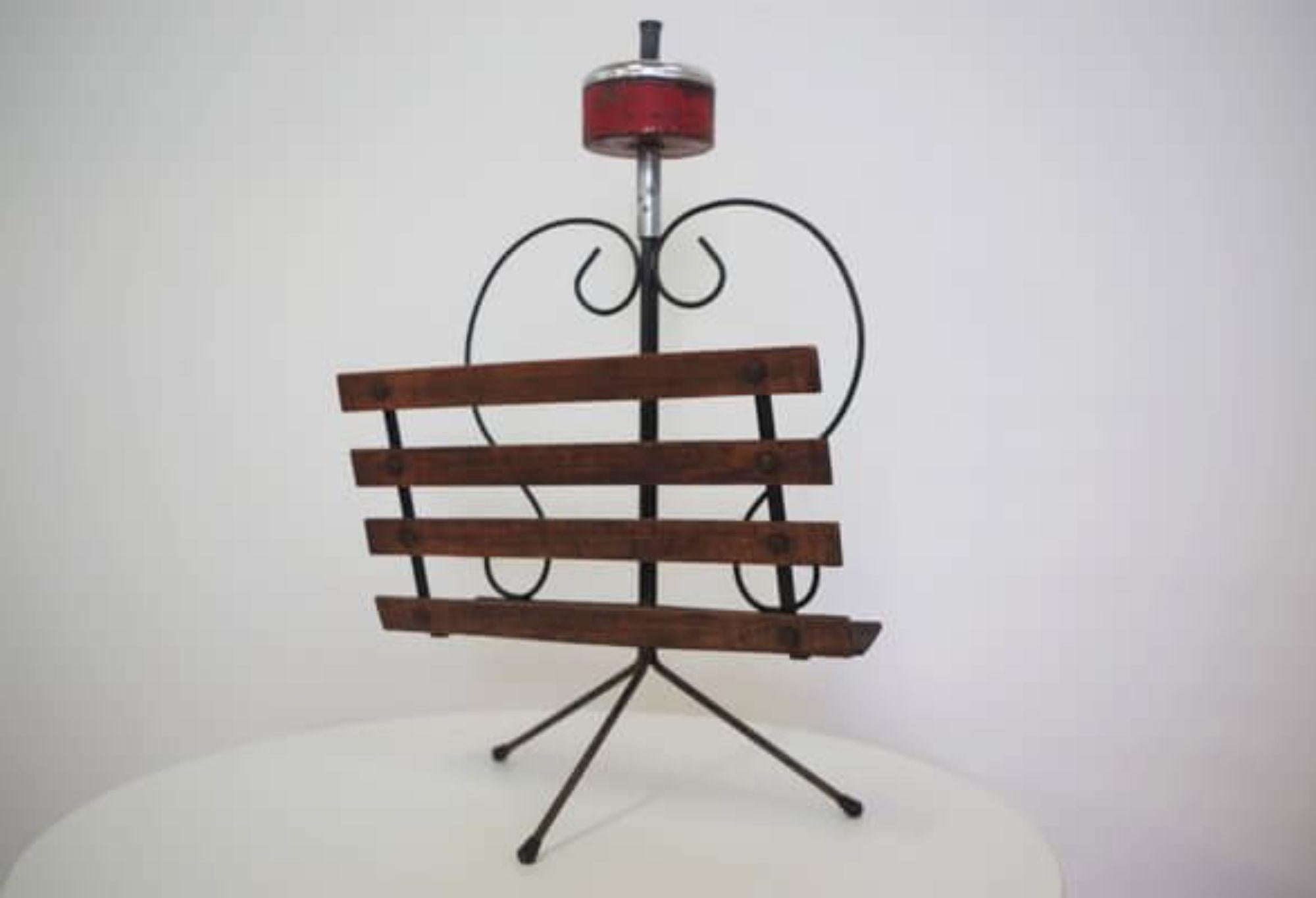Stylish 1950s Wood and Iron Ashtray & Magazine Rack Combo – Mid-Century Utility and Charm

Elevate your living space with this unique 1950s ashtray and magazine rack combo, expertly crafted from wood and iron. This multifunctional piece combines