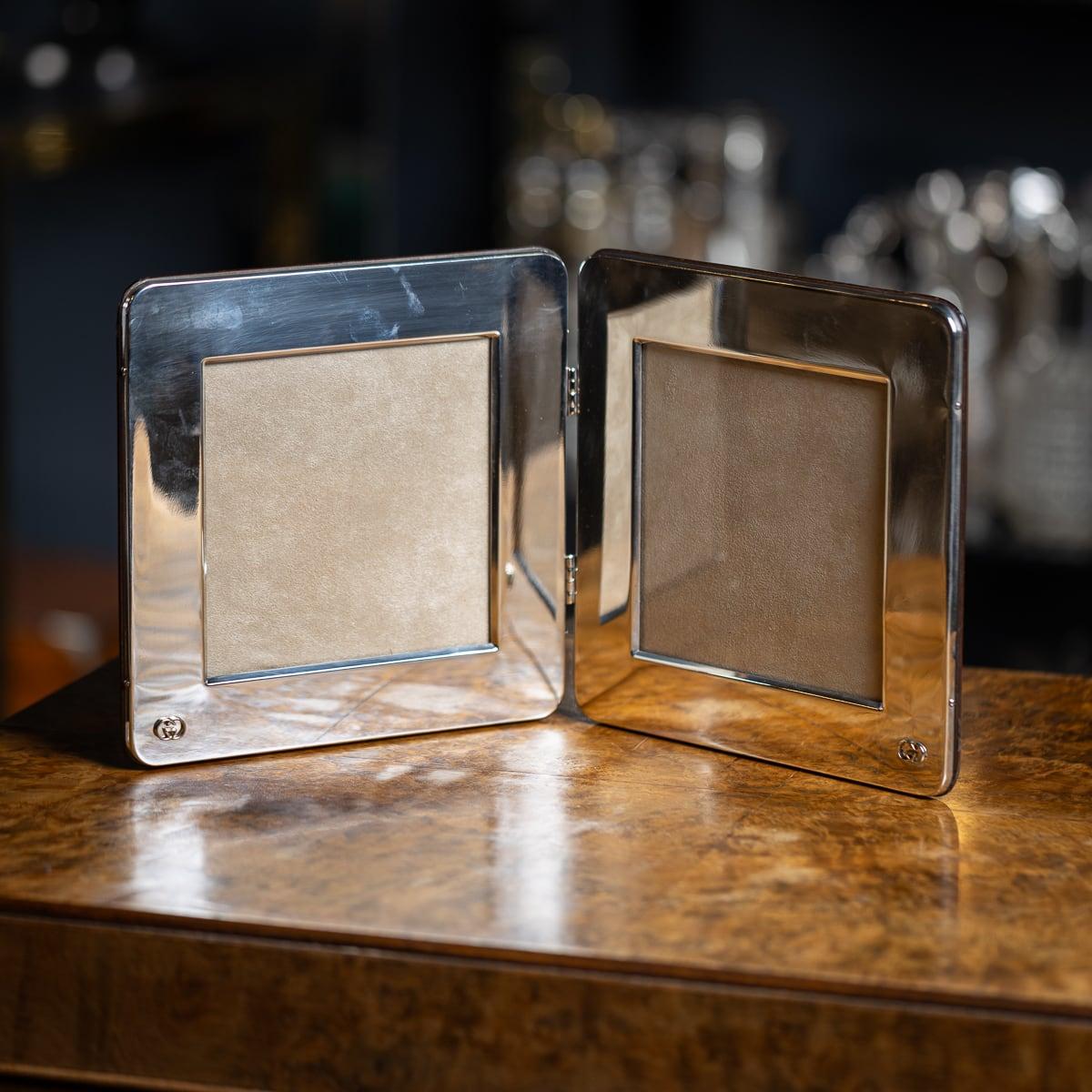 A stylish 20th Century Gucci silver plated double photo frame dating back to the 1970's, elegantly adorned with the iconic Gucci 
