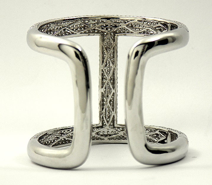 Stylish and Large White Gold Diamond Encrusted Cuff Bangle In Excellent Condition In Palm Beach, FL