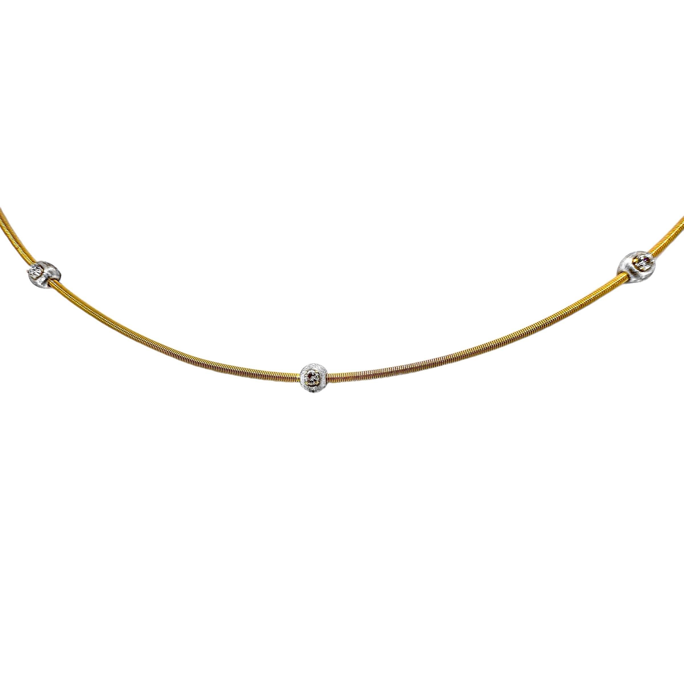 This stylish, contemporary  18k yellow and white gold and diamond choker necklace is precision crafted in the finest Italian gold manufacturing tradition. This lightweight beauty is comfortable to wear, and is ideal for causal wear, day or night.