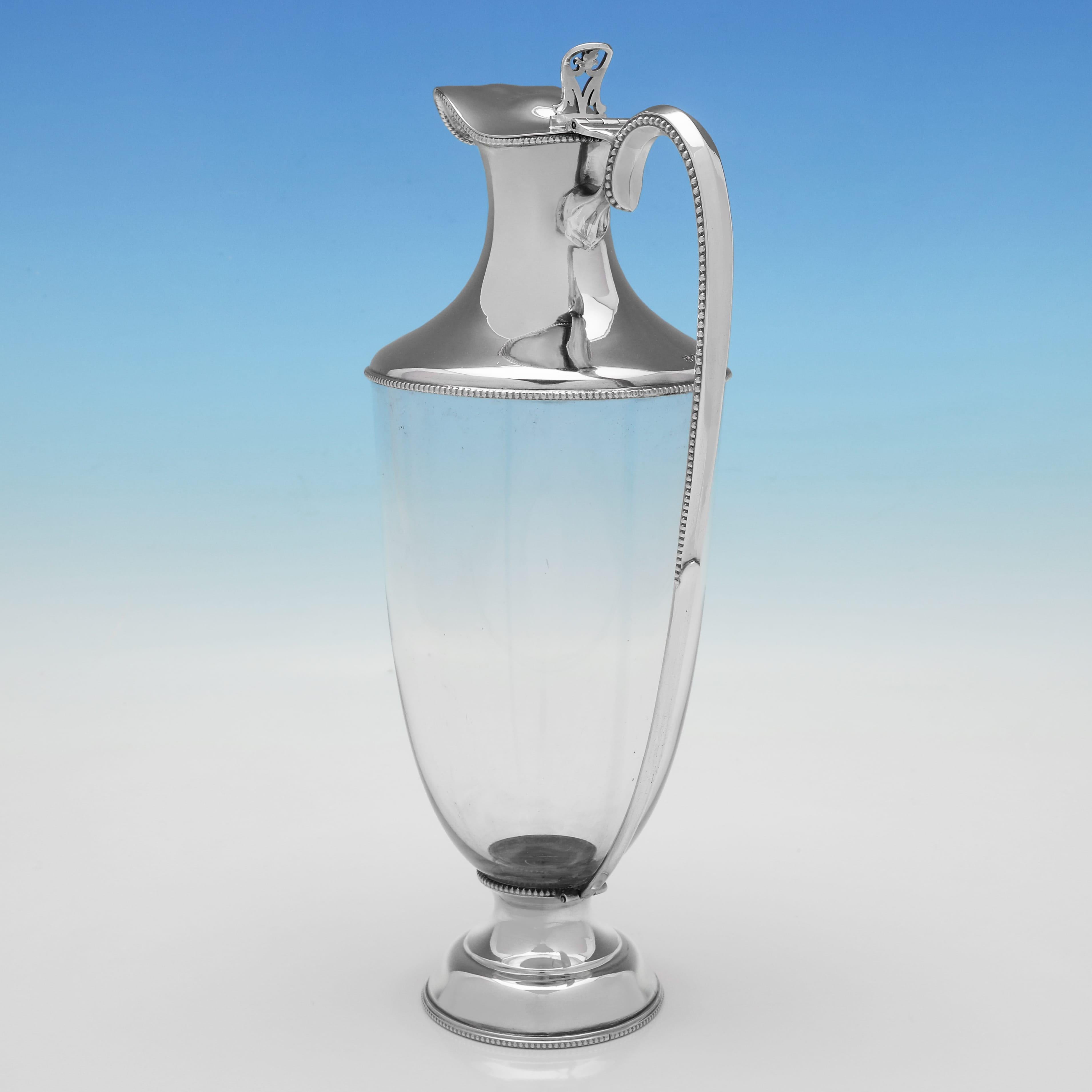 Stylish and rare pair of antique sterling silver claret jugs made in 1918 In Good Condition For Sale In London, London