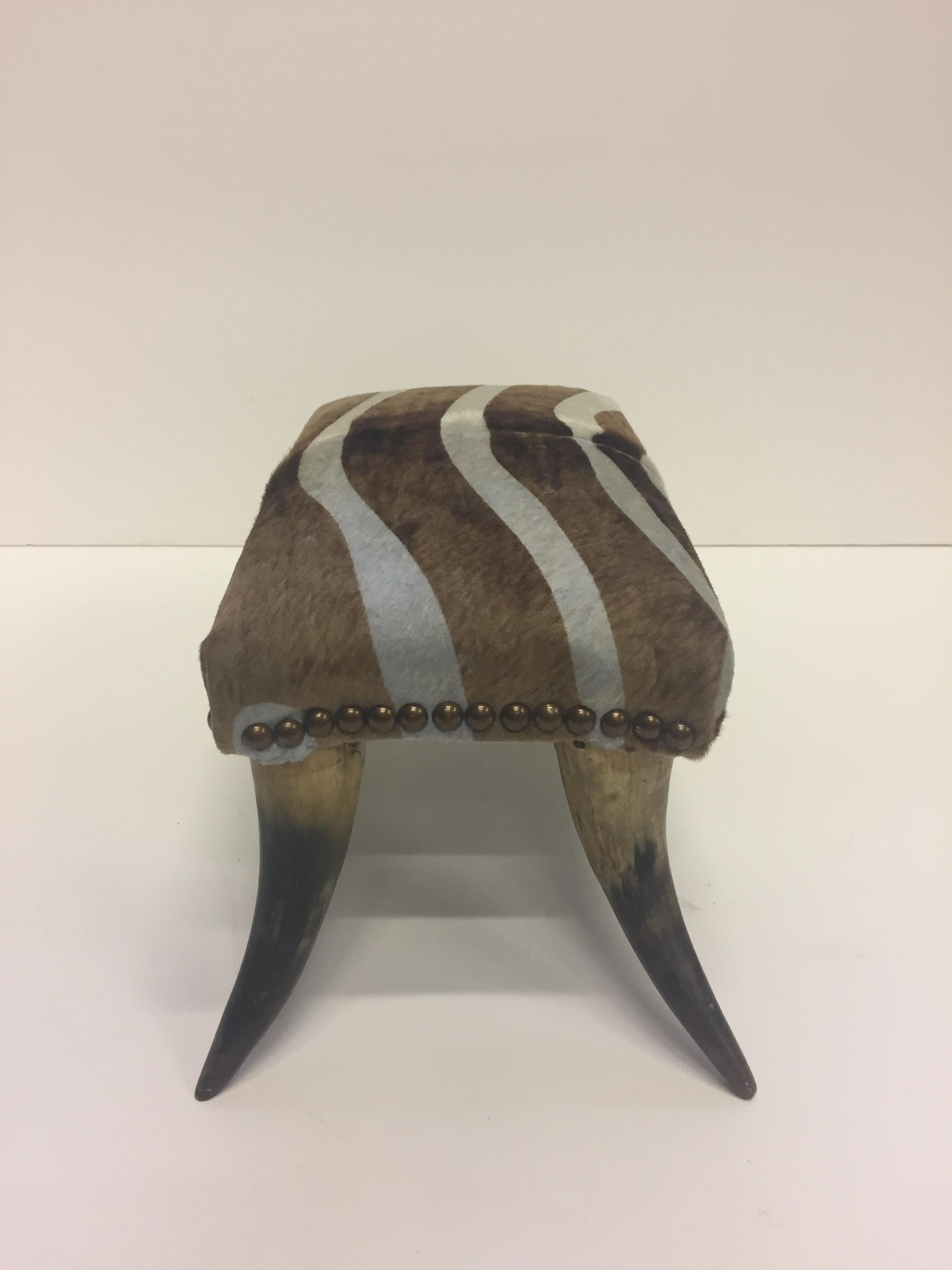 Stylish Antique Horn Footstool with Cowhide Zebra Upholstery In Excellent Condition In Hopewell, NJ