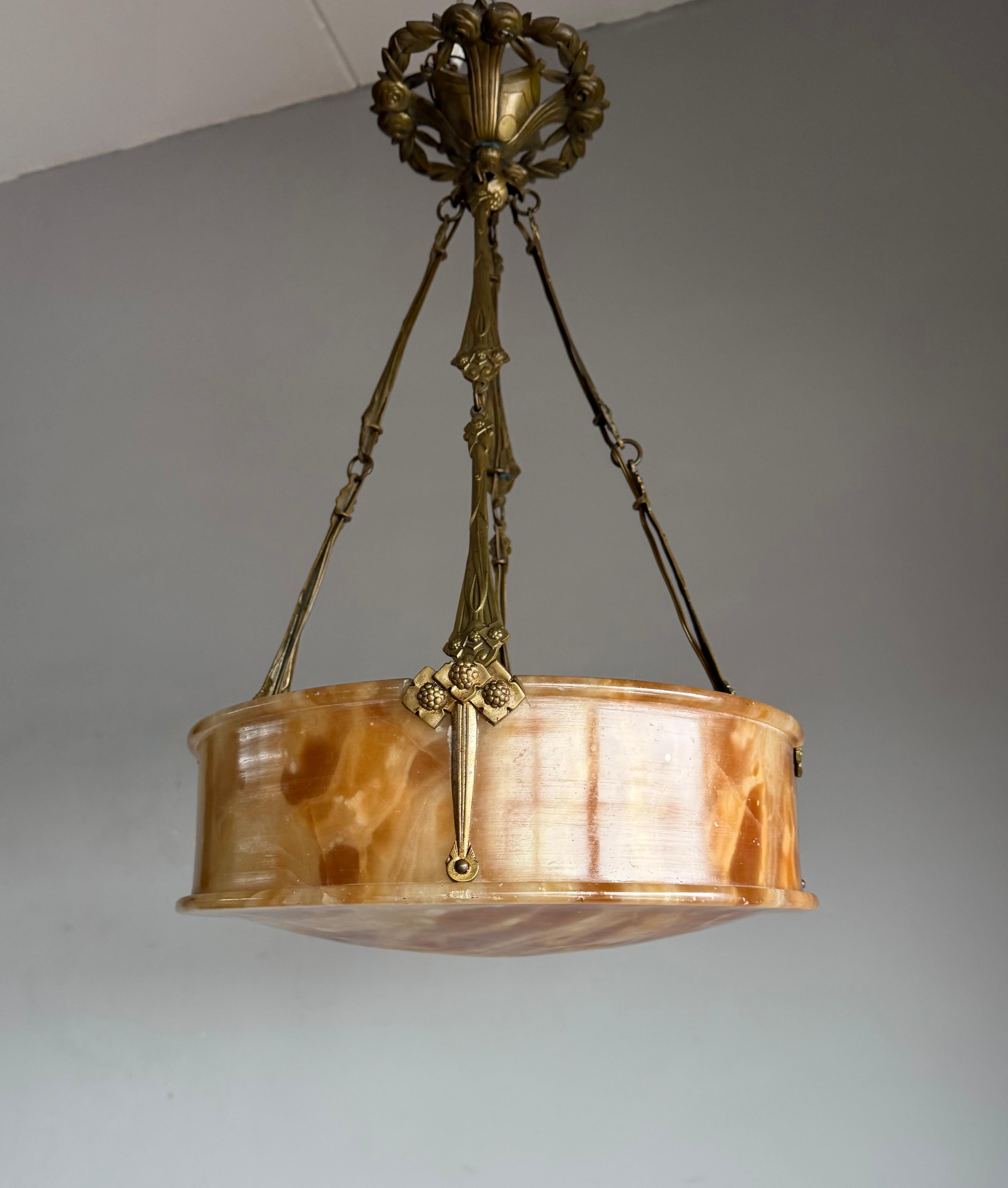 Stunning geometrical Art Deco design alabaster light fixture.

This pure and perfect size Art Deco pendant from the early 1900s is an absolute joy to come home to. The rare and beautiful, diamond shape alabaster shade is perfectly complemented by