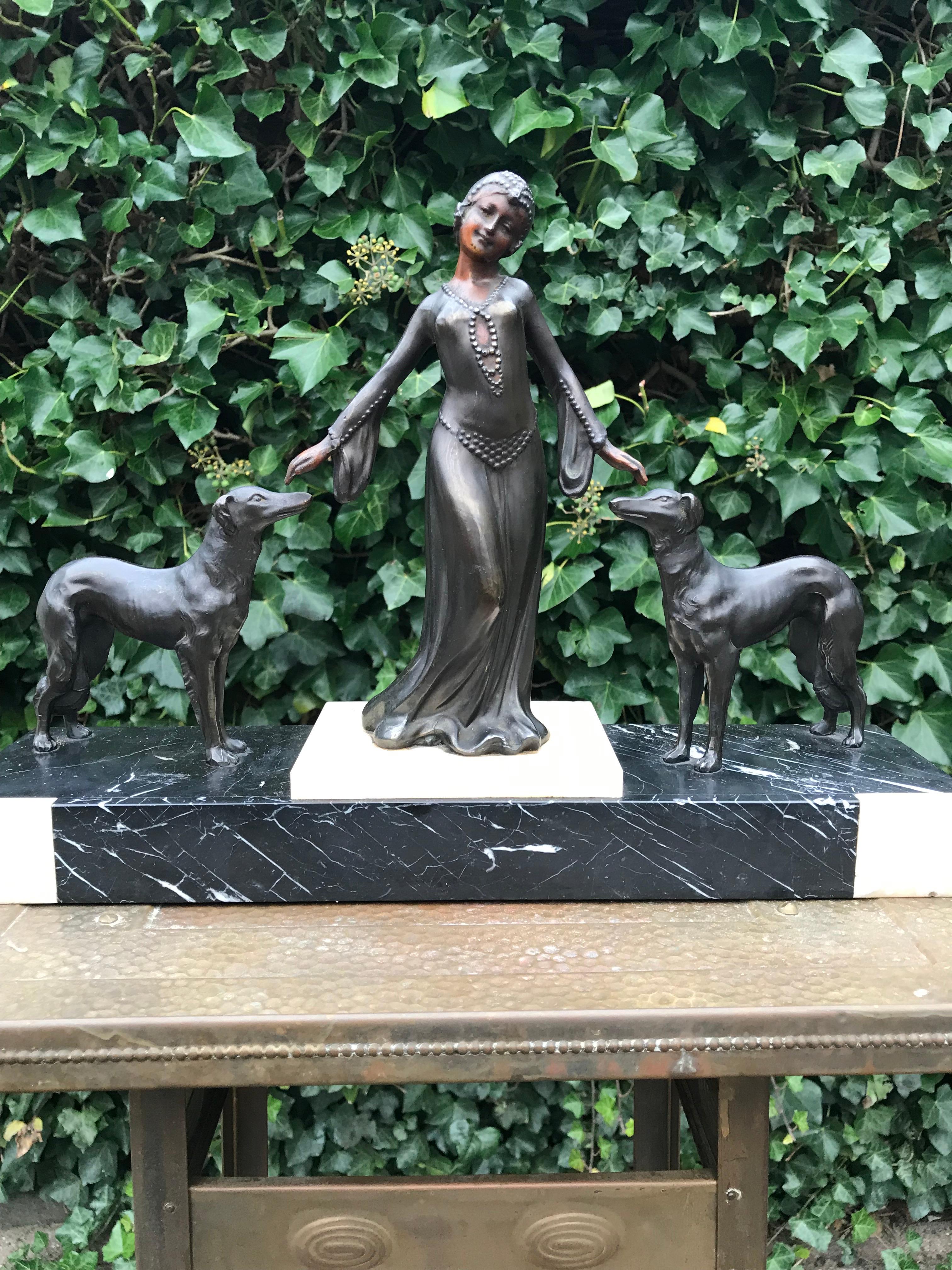 Hand-Crafted Stylish Art Deco Lady in Dress with Her Greyhounds Sculpture on a Marble Base For Sale