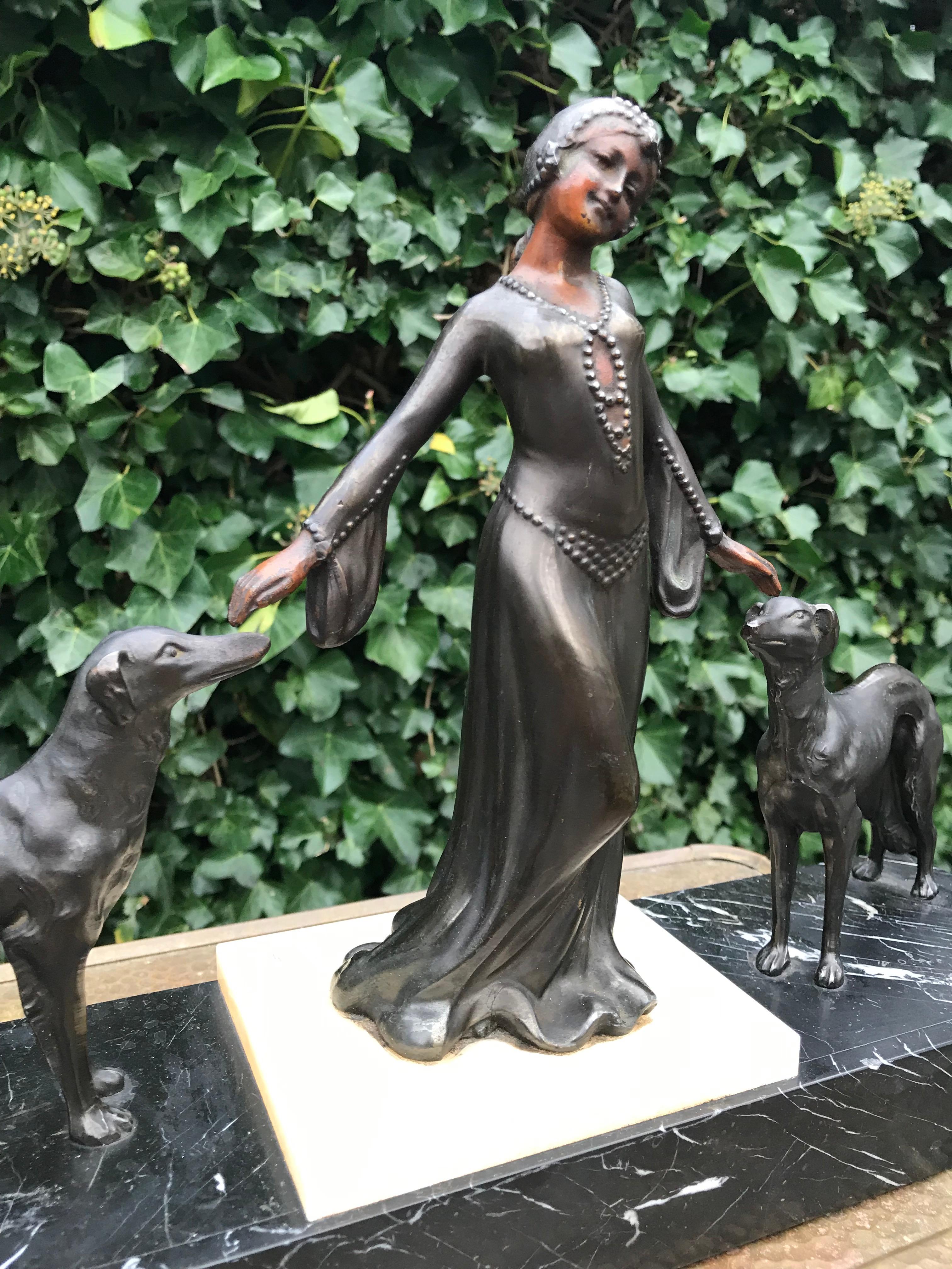 Stylish Art Deco Lady in Dress with Her Greyhounds Sculpture on a Marble Base In Good Condition For Sale In Lisse, NL