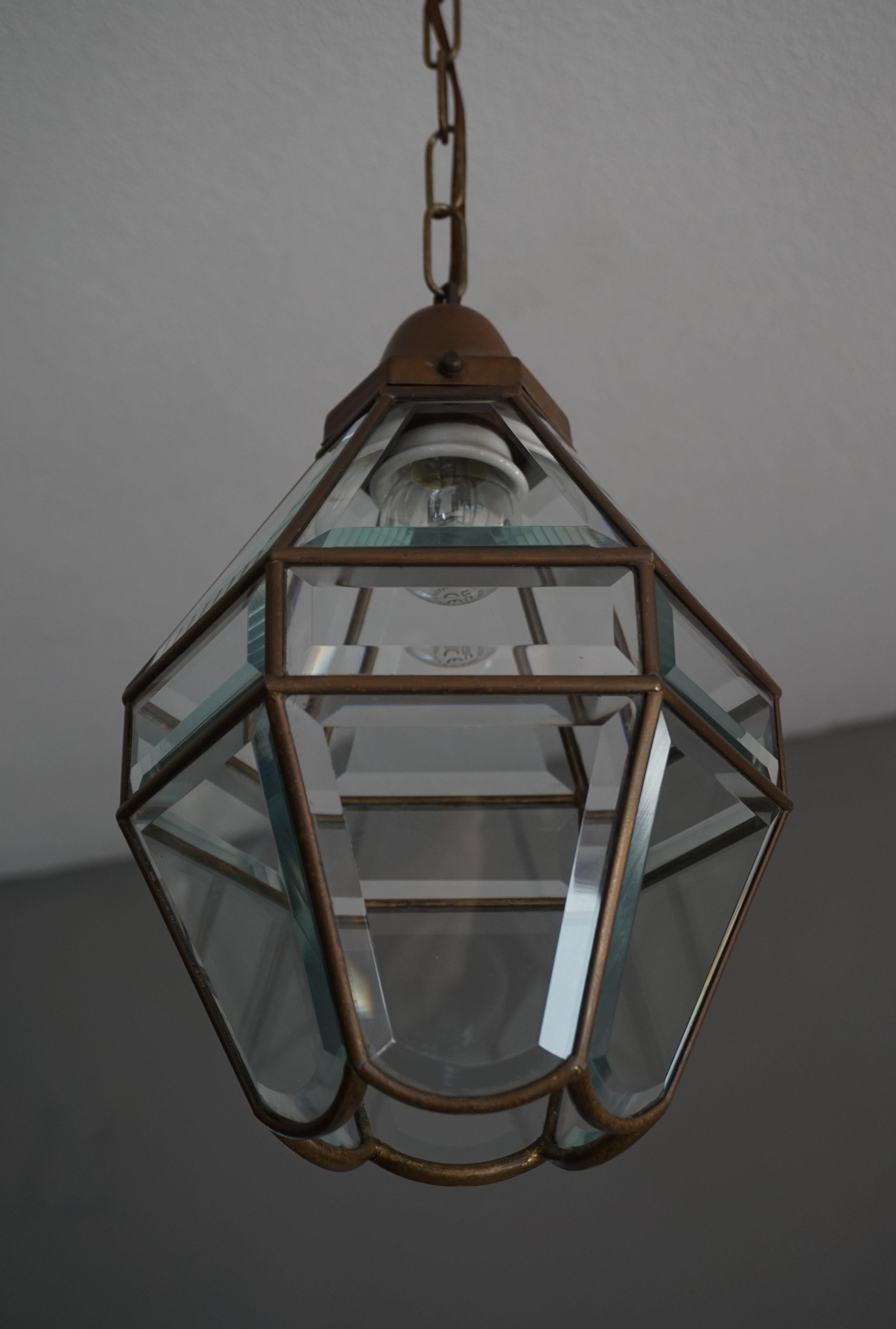 Museum quality and condition pendant from the early 1900s.

If you are looking for a great quality and stylish light fixture to grace your living space then this early twentieth century pendant could be perfect. Mounted on the ceiling of your