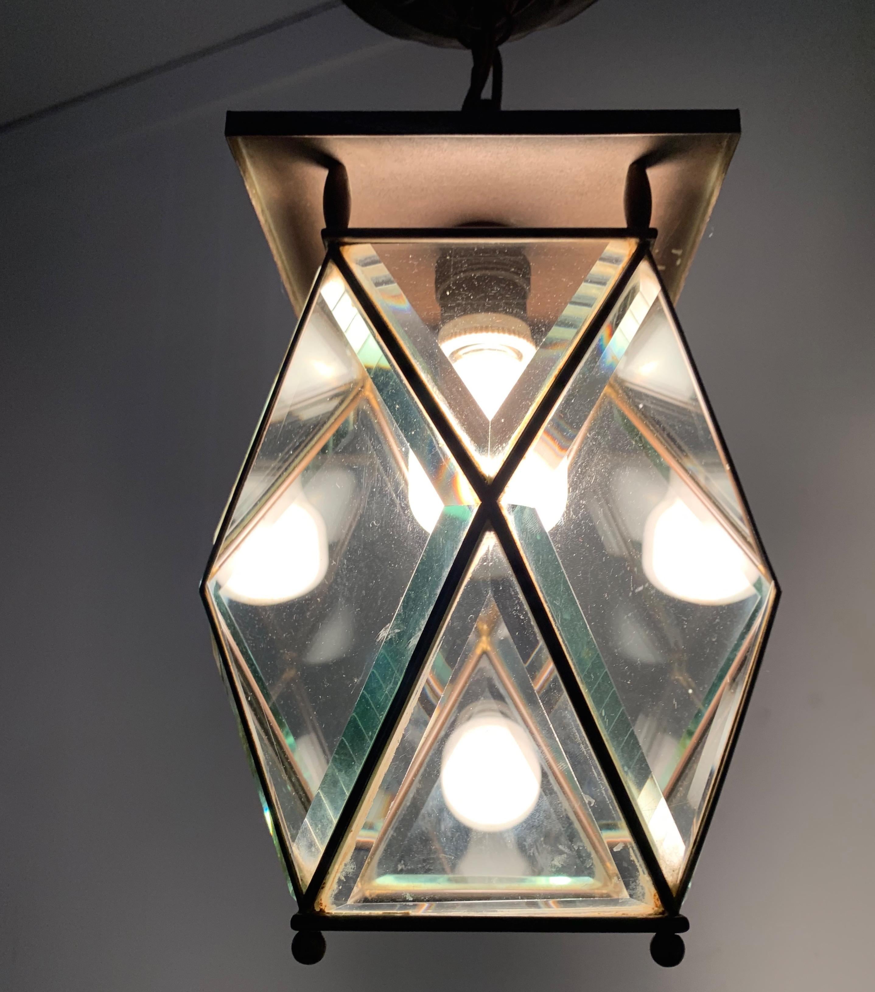Museum quality and condition, single light pendant from the early 1900s.

If you are looking for a great quality and stylish light fixture to grace your living space then this early 20th century pendant could be perfect. Mounted on the ceiling of