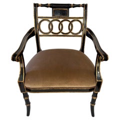 Fauteuil Maitland Smith noir et or de style Hollywood Regency