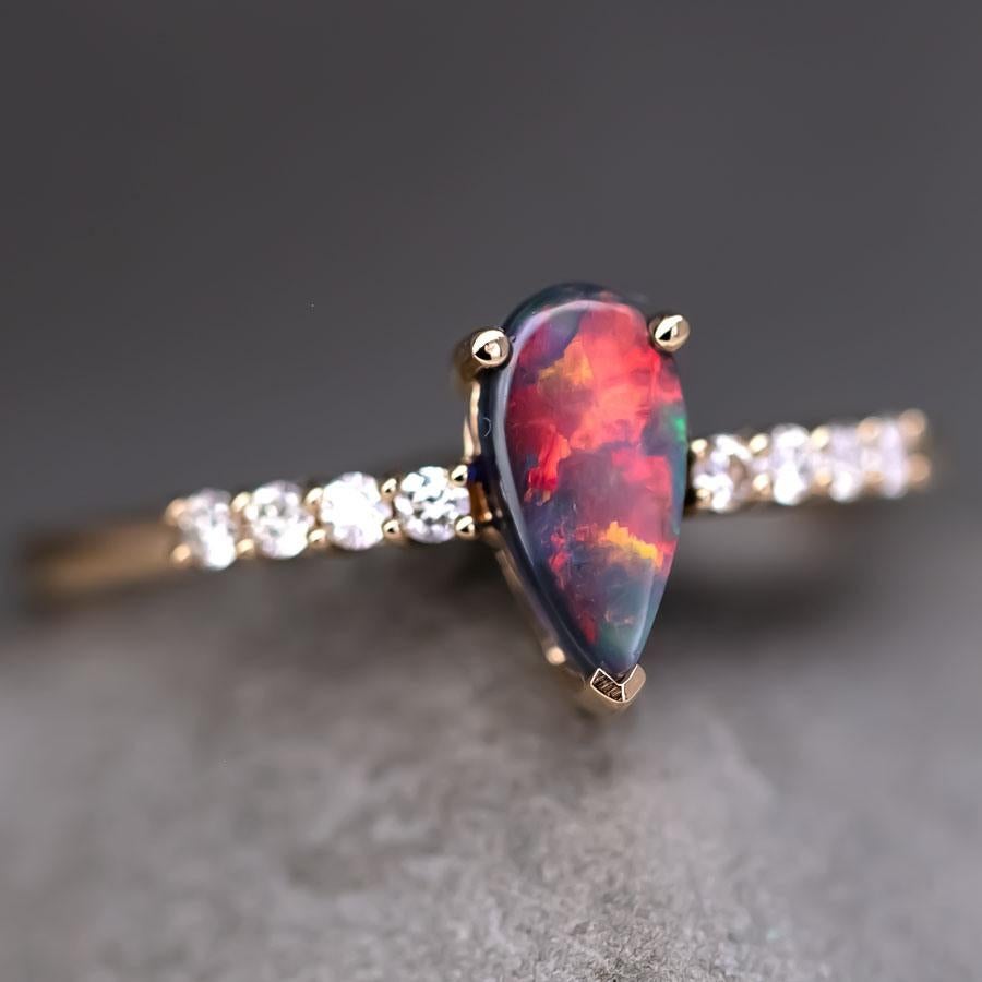 Stylish Australian Black Opal & Diamond Engagement Ring 18K Yellow Gold.



It is a top-quality Australian black opal. Please note that the stone has a sand spot.


Free Domestic USPS First Class Shipping!  Free One Year Limited Warranty!  Free Gift
