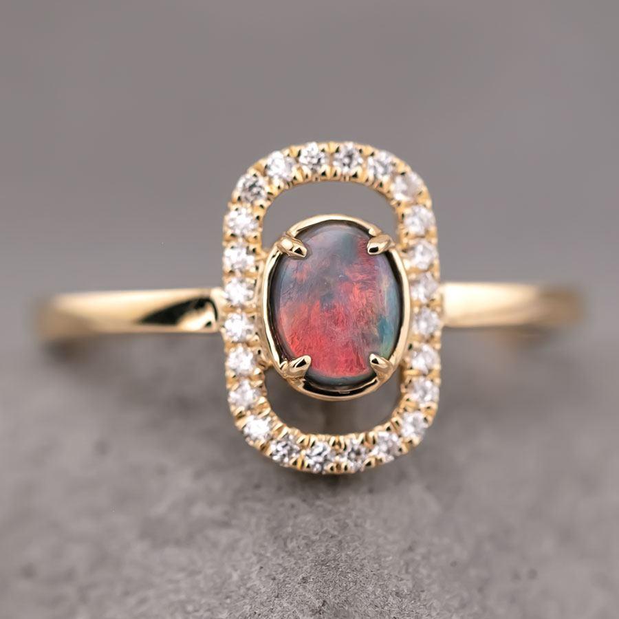 Stylish Australian Black Opal & Halo Diamond Engagement Ring 18K Yellow Gold.




Free Domestic USPS First Class Shipping!  Free One Year Limited Warranty!  Free Gift Bag or Box with every order!



Opal—the queen of gemstones, is one of the most